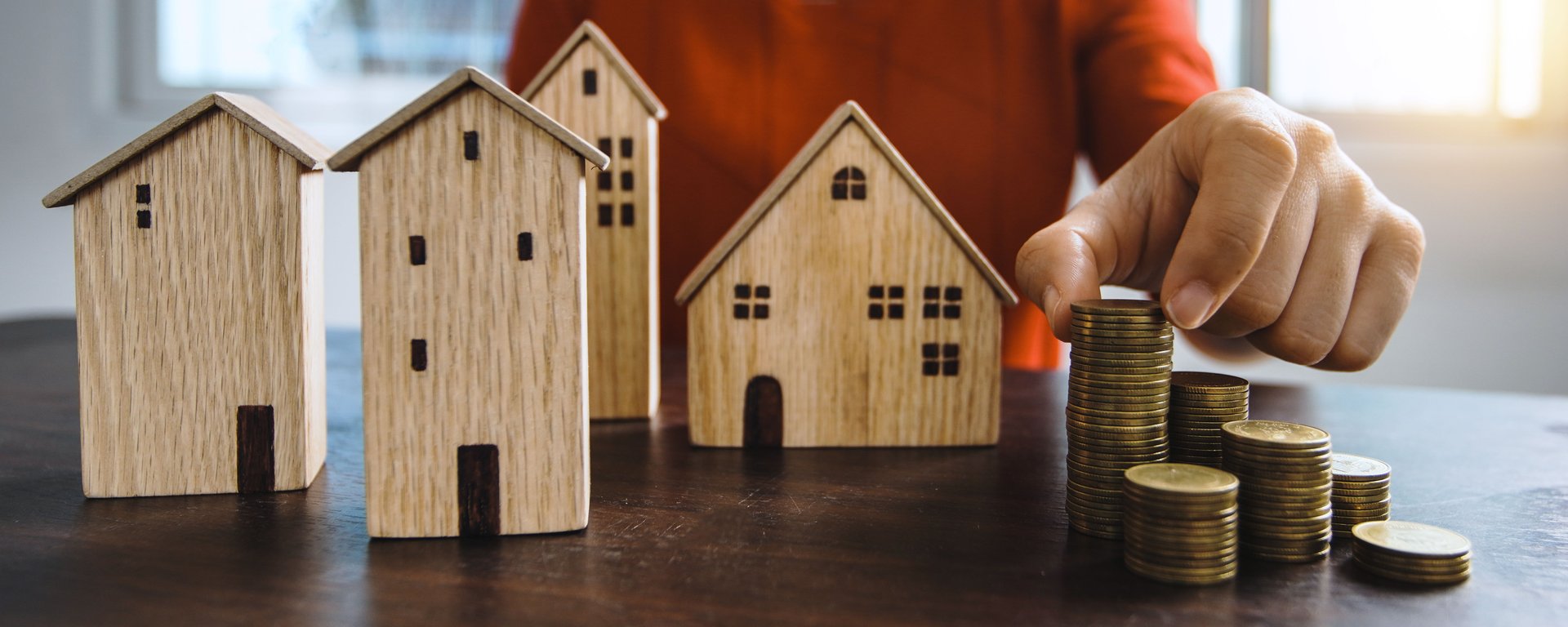 brown wooden house on brown wooden table