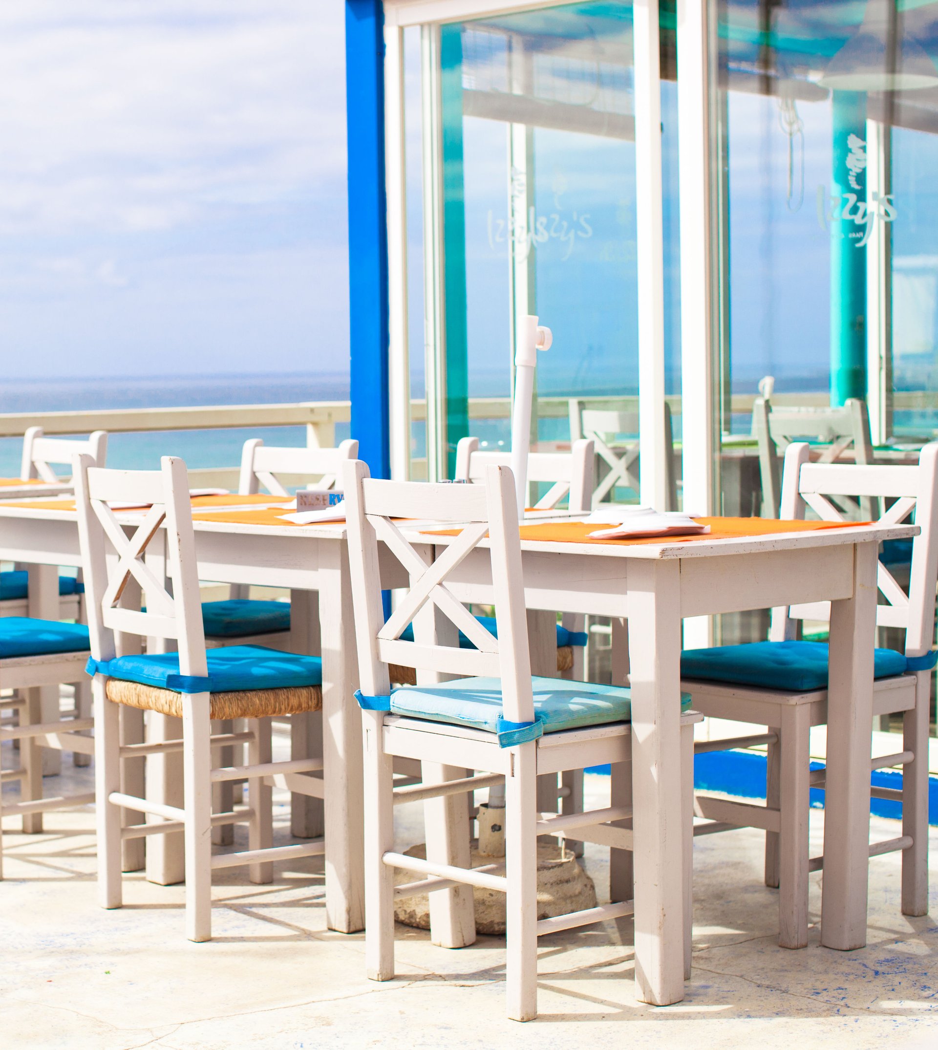 Chairs at seaside restaurant