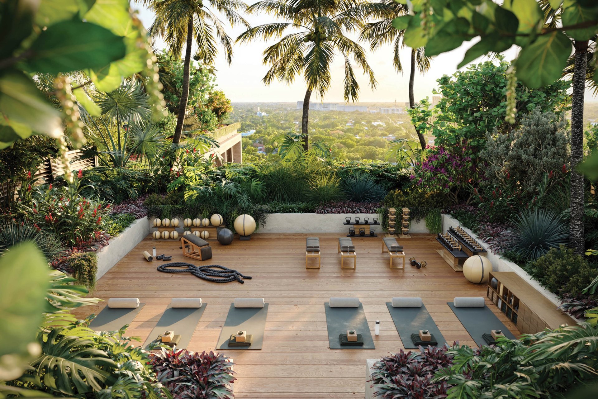 Outdoor fitness deck with yoga mats and weights, surrounded by tropical landscaping and palm trees.