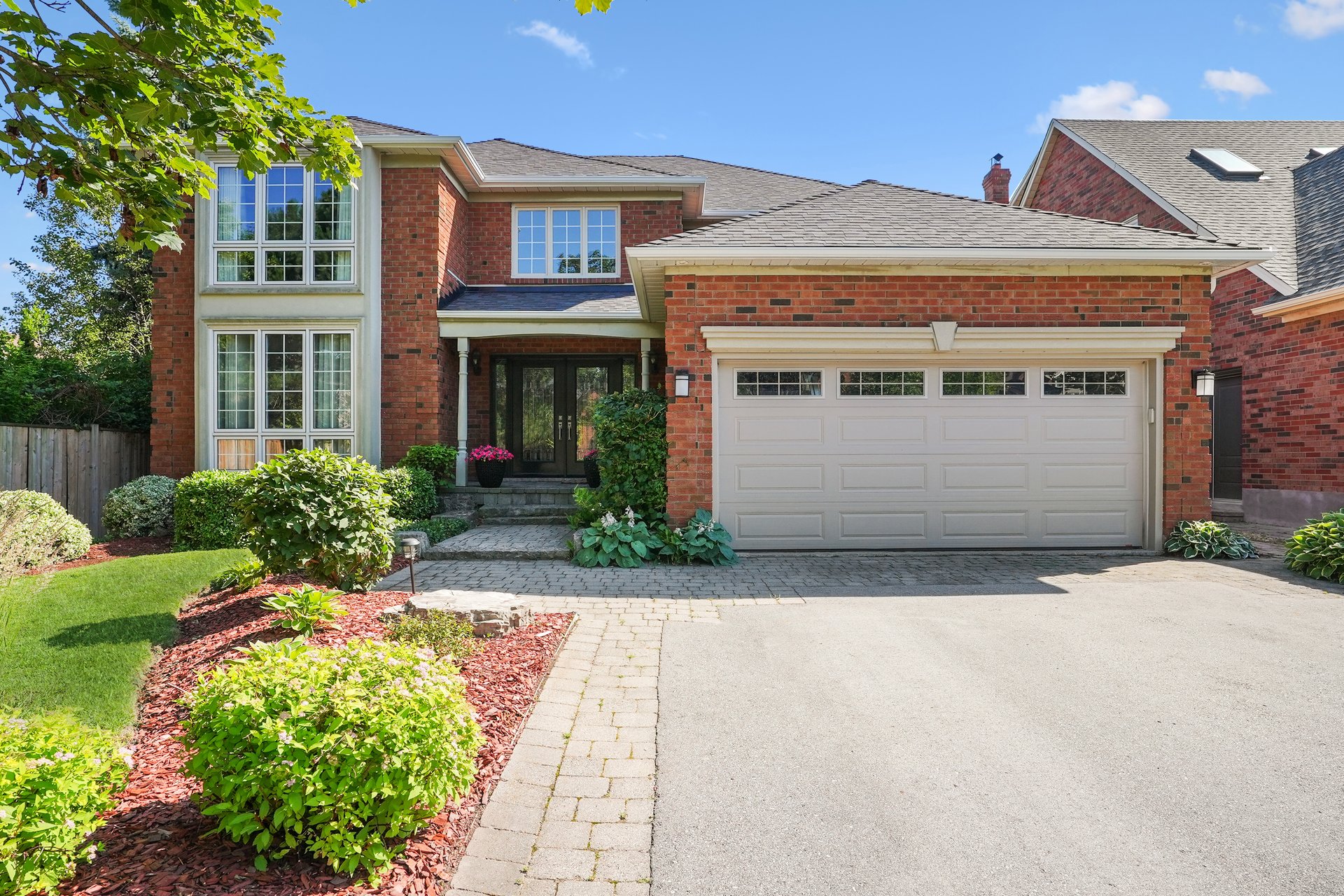 Prestigious Glen Abbey living with a backyard made for summer