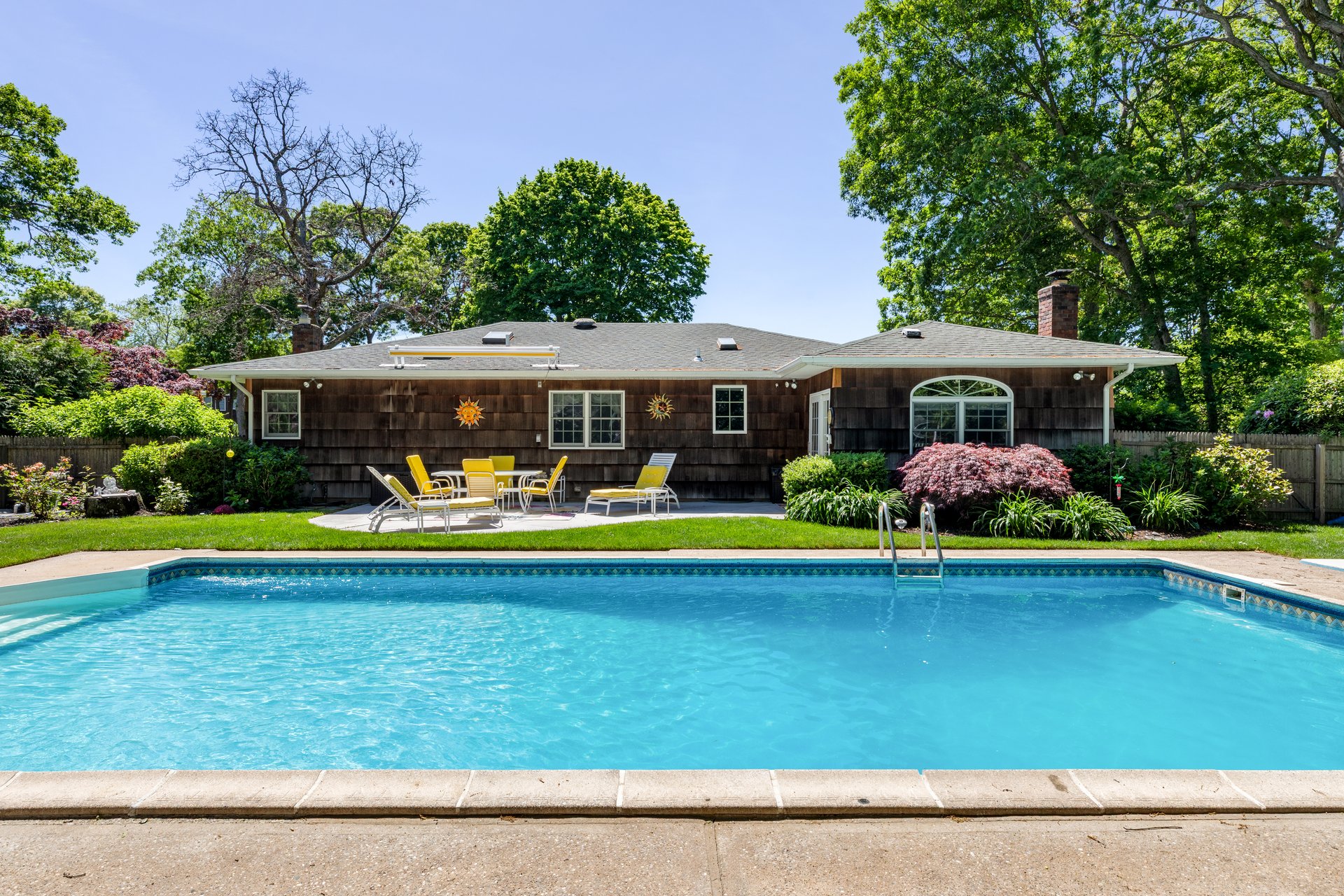A Quiet Village Setting with a Pool at Its Center