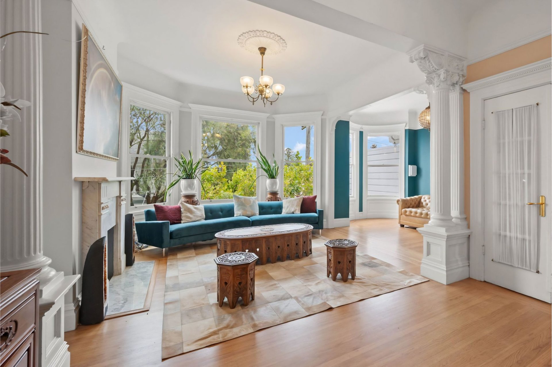 Light-filled living room of 449 Frederick Street, a Cole Valley Victorian TIC in San Francisco