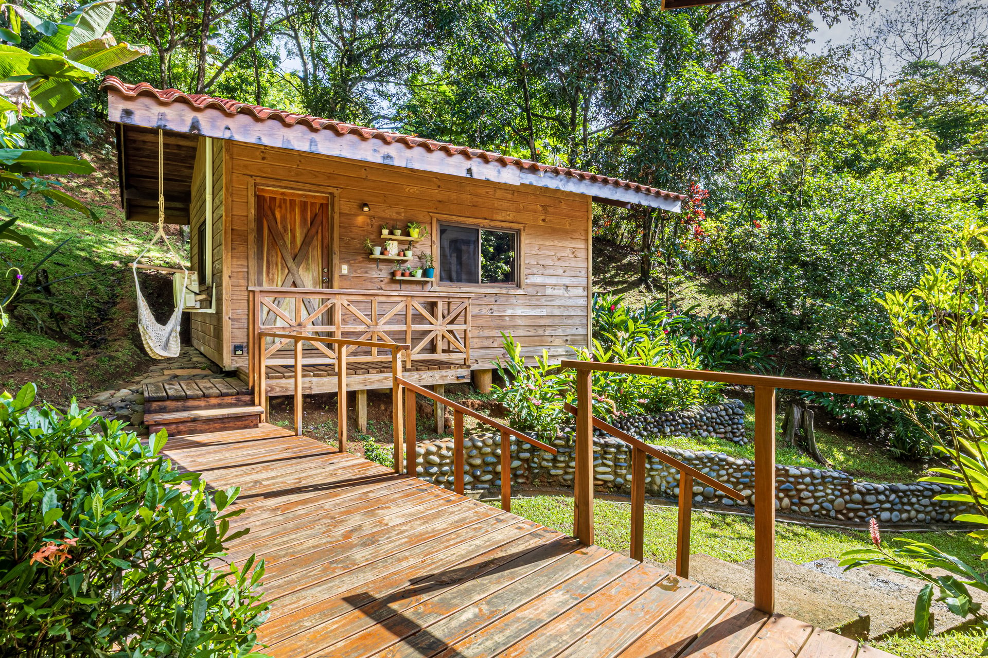 A Jungle House Built of Wood & River Dreams