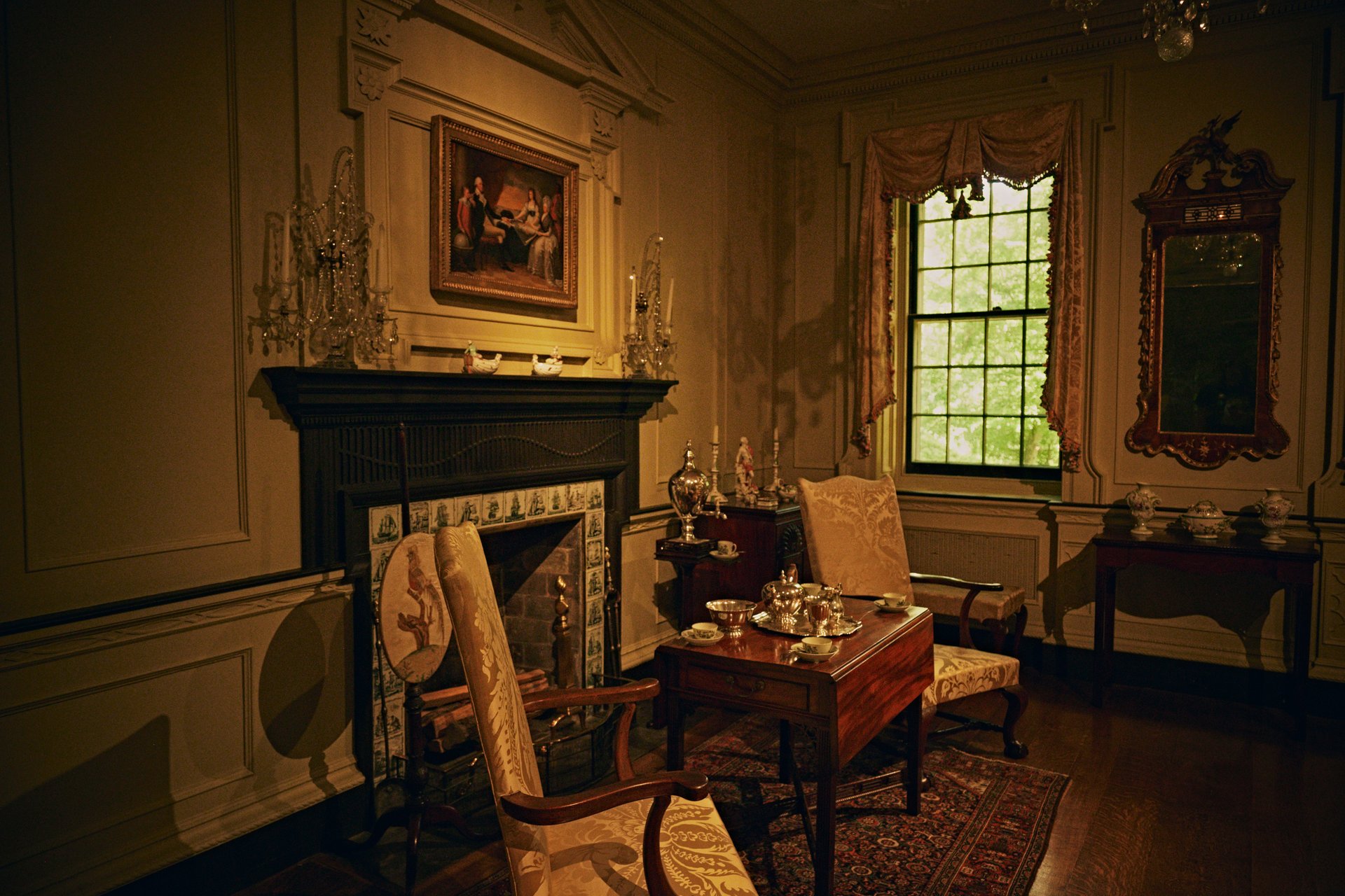 Elegant interior vignette with antique furniture and decorative objects