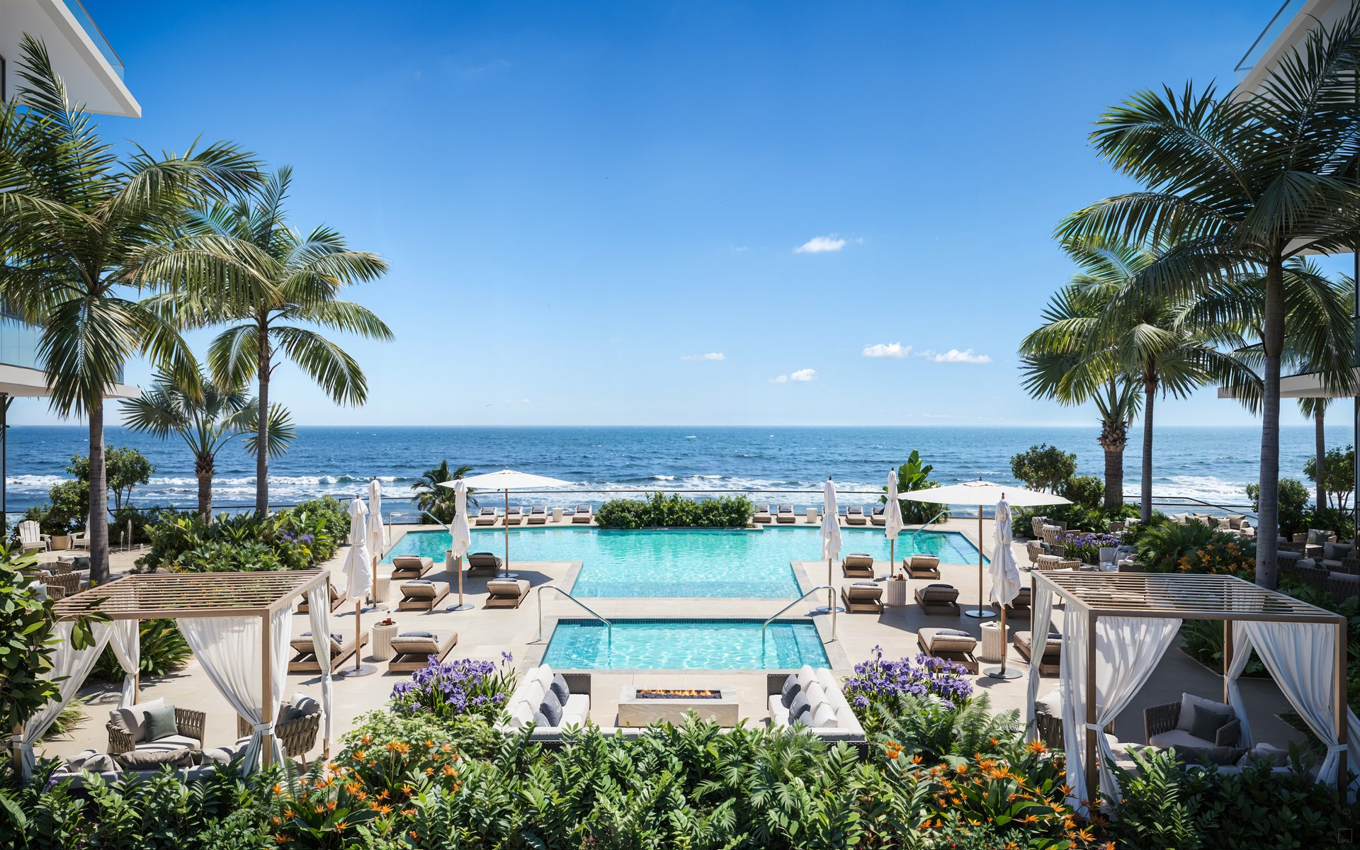 Oceanfront pool deck with private cabanas