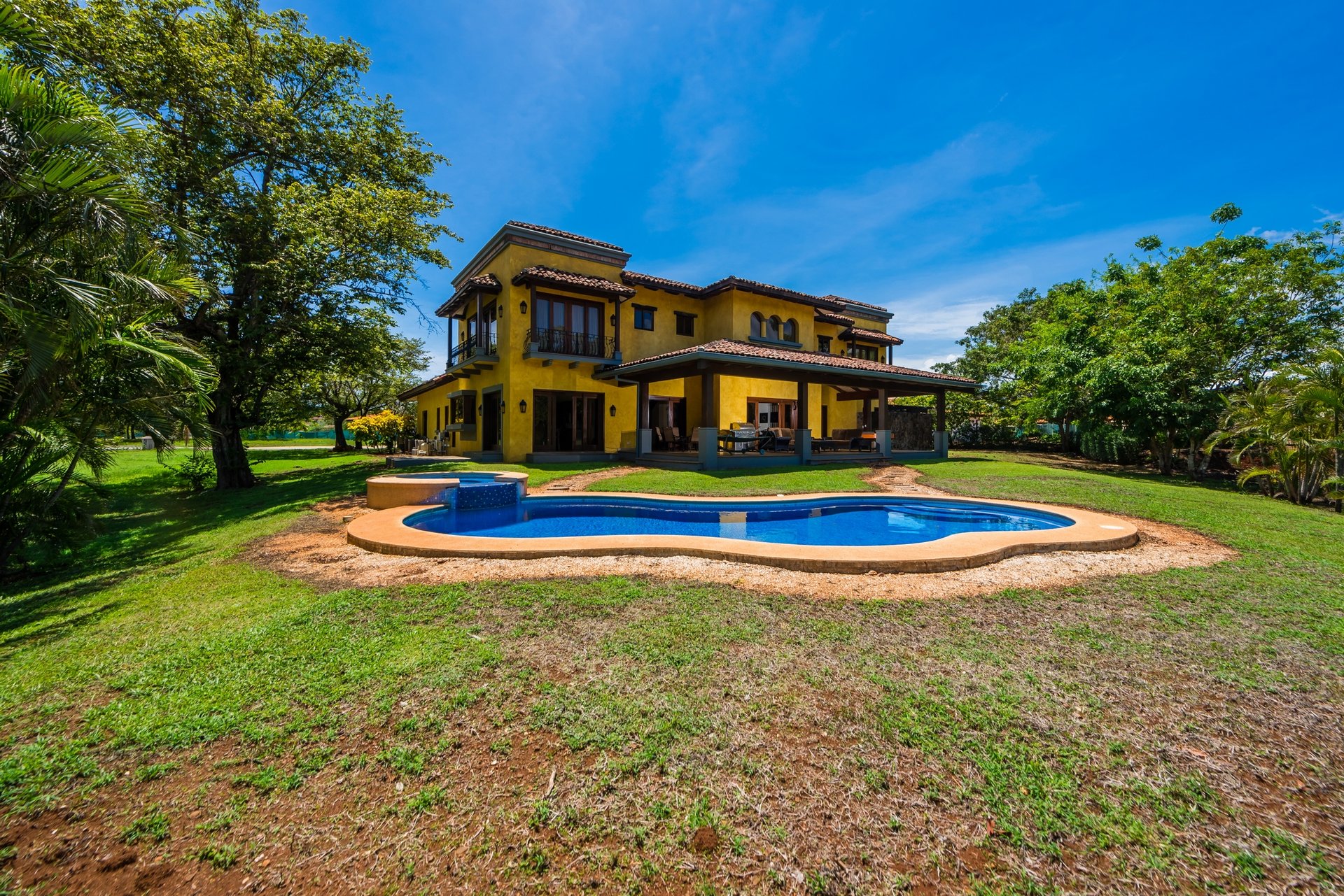 Casa Miraflores, Reserva De Golf #94 | Welcome to Casa Miraflores, an exquisite colonial-style estate home located in Hacienda Pinilla!