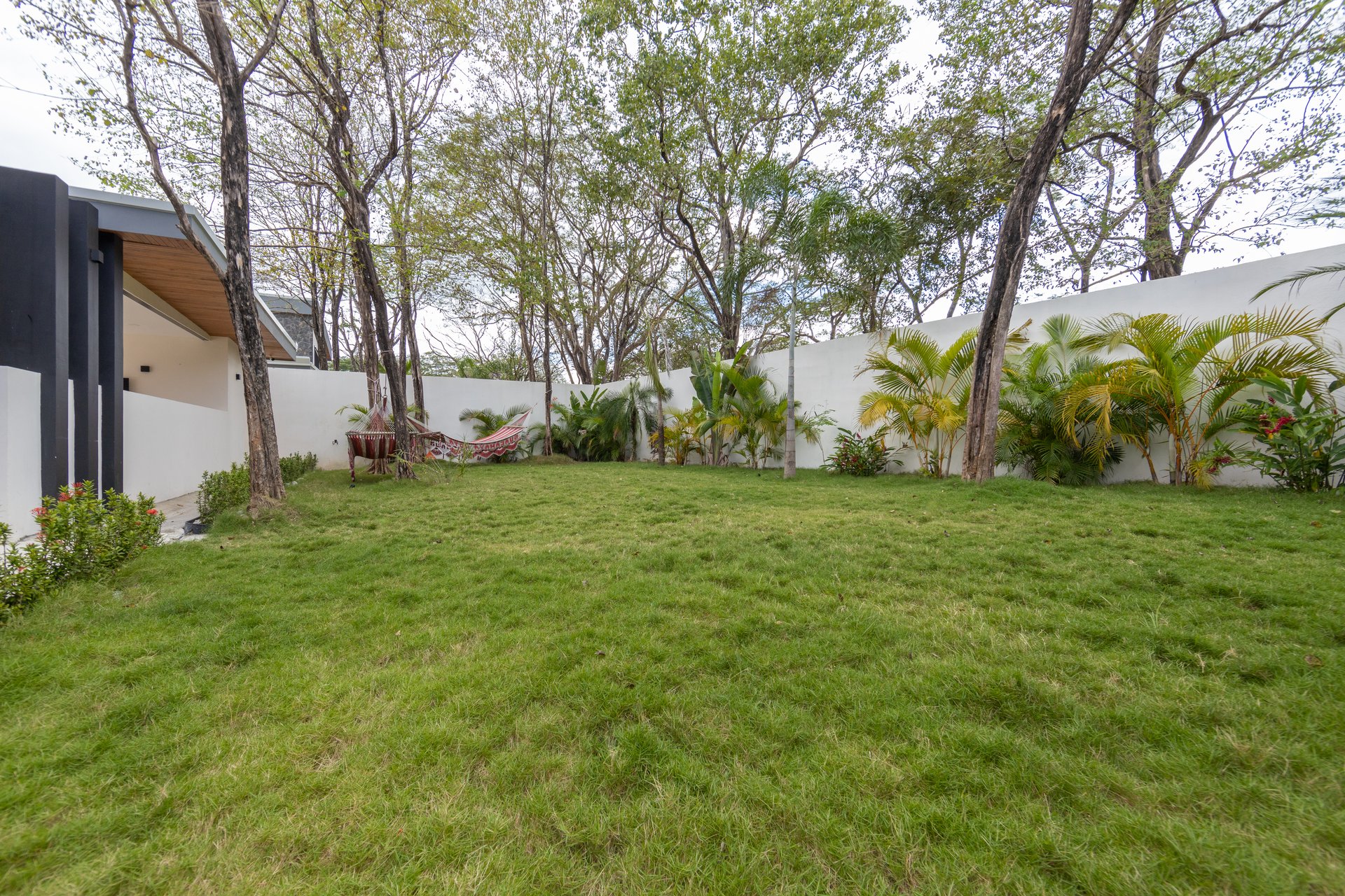 Casa Guacamaya Roja Lot B20 | Elegant 4-Bedroom Home with Pool & Outdoor Kitchen, Steps from Playa Grande Beach, Costa Rica