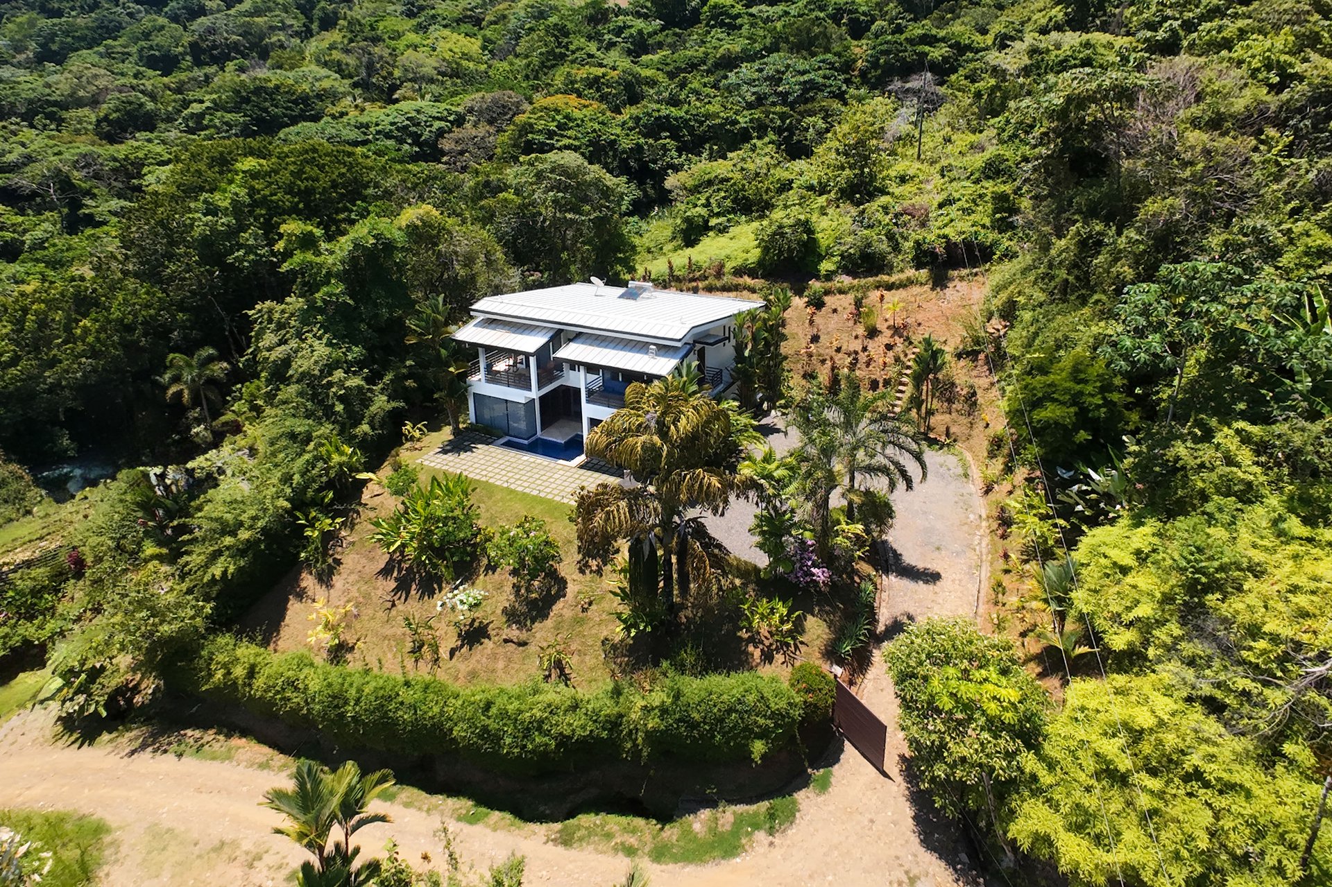 Stylish 4 bedroom home in the popular Dominicalito community, 7 minutes to the beach