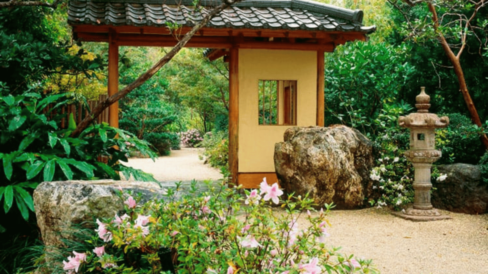 Morikami Museum traditional Japanese garden with stone lantern and tea house in Florida - The Edit Real Estate October travel guide