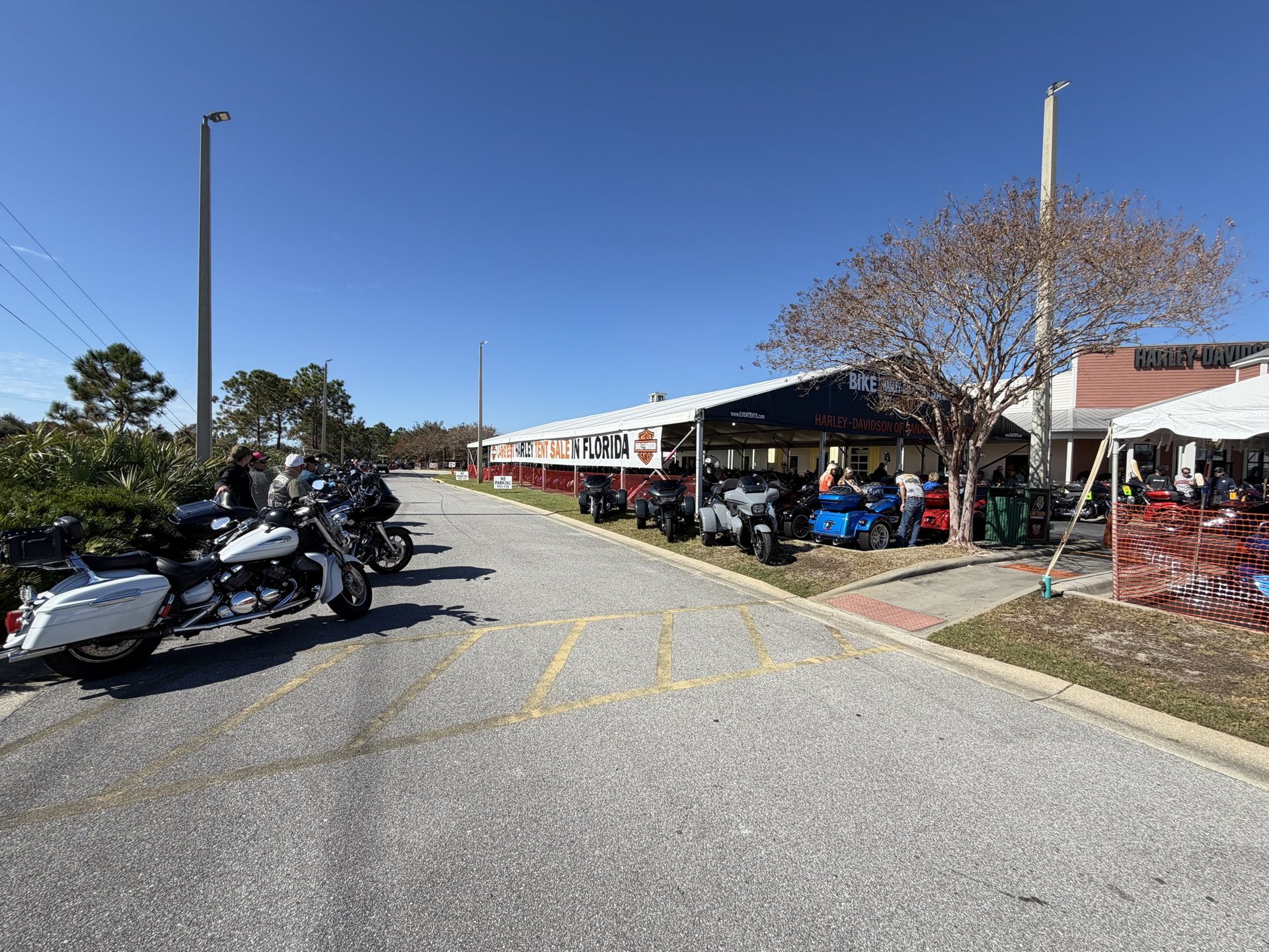 Motorcycles parked along the drive at Harley-Davidson of Panama City Beach during Thunder Beach