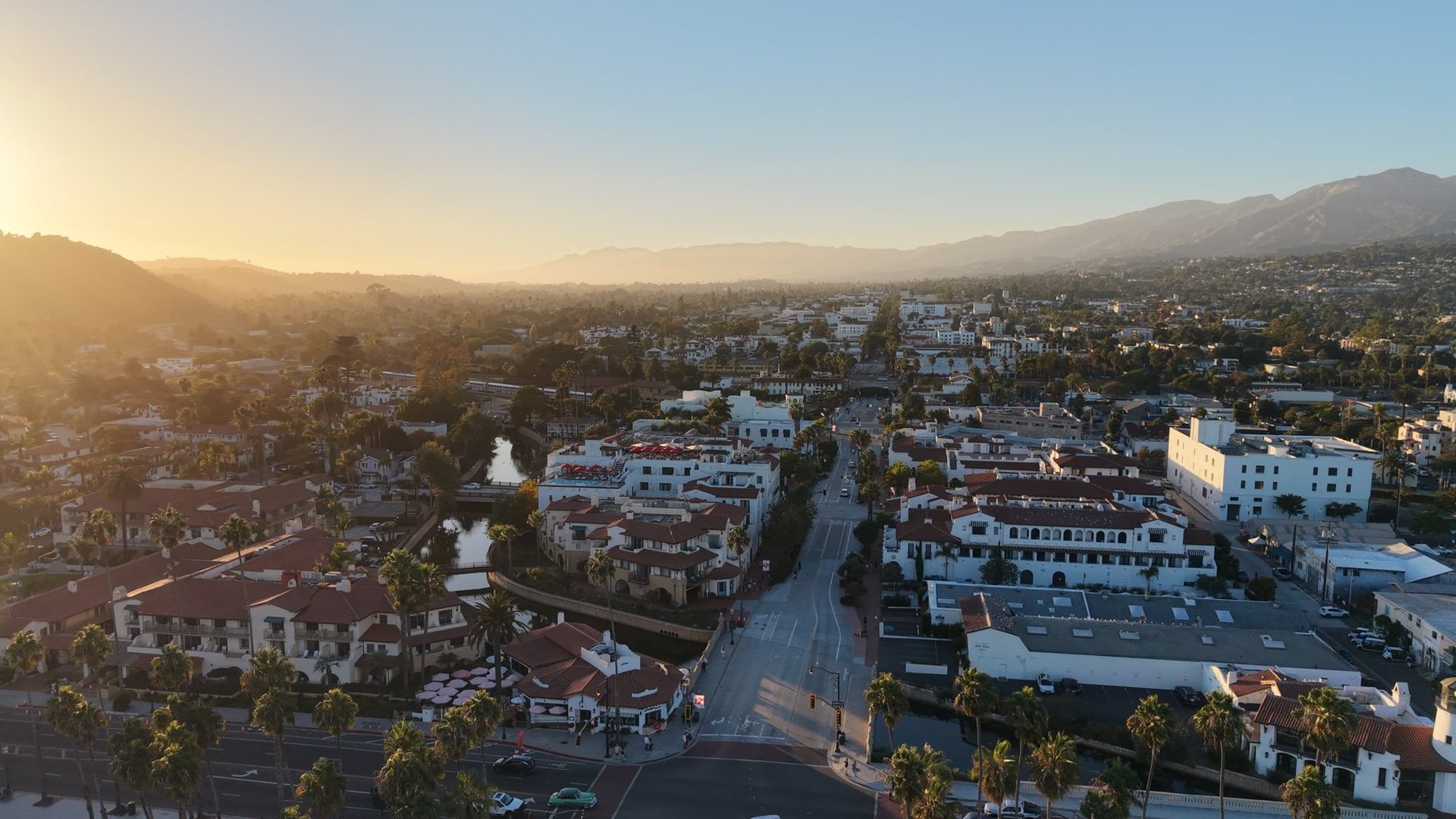 Downtown Santa Barbara red-tile roofs and the Santa Ynez Mountains at sunset