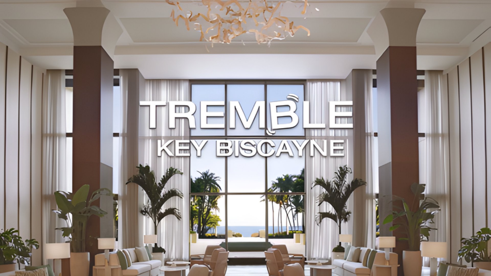 TREMBLE Key Biscayne luxury wellness center lobby featuring high ceilings, palm plants, and ocean views - The Edit Real Estate