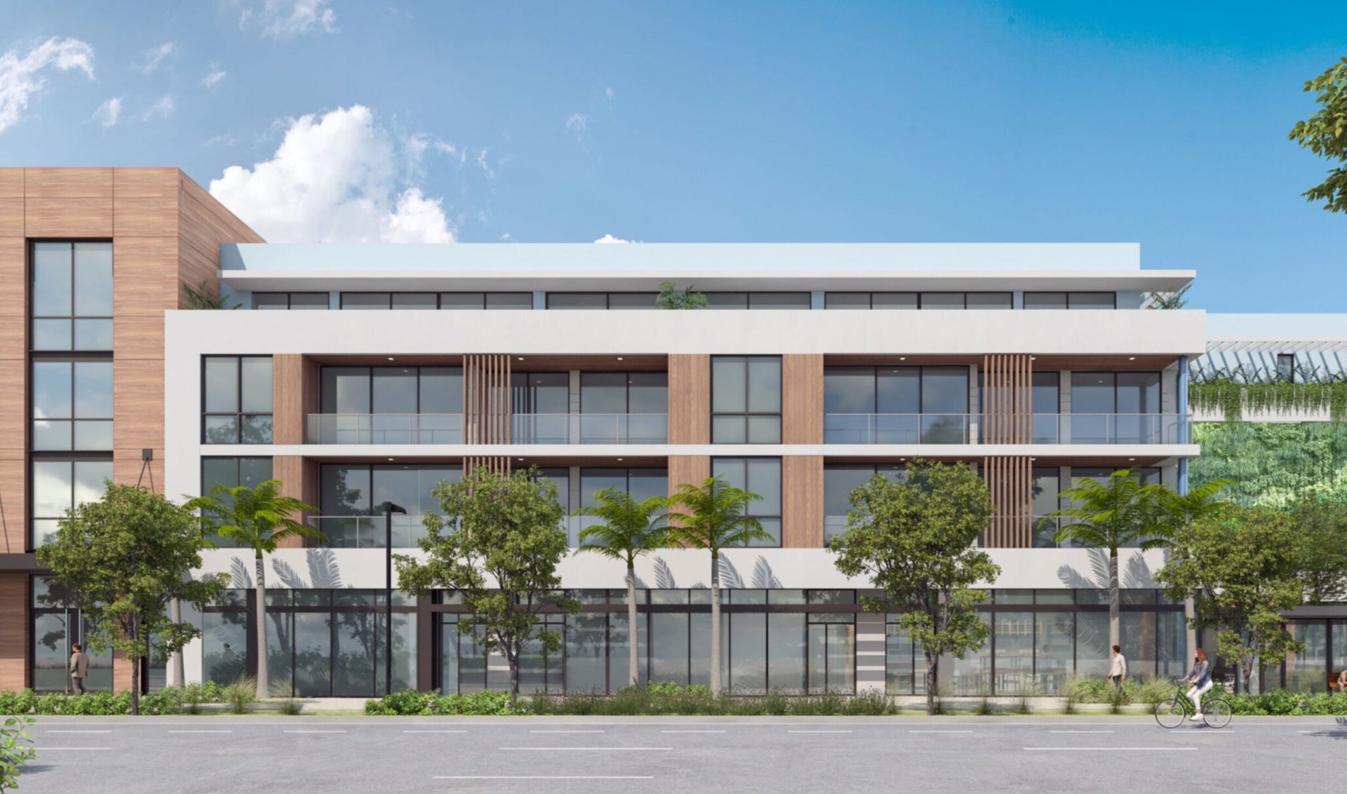 Modern low-rise condominium with glass balconies, wood accents, and palm trees along the street.