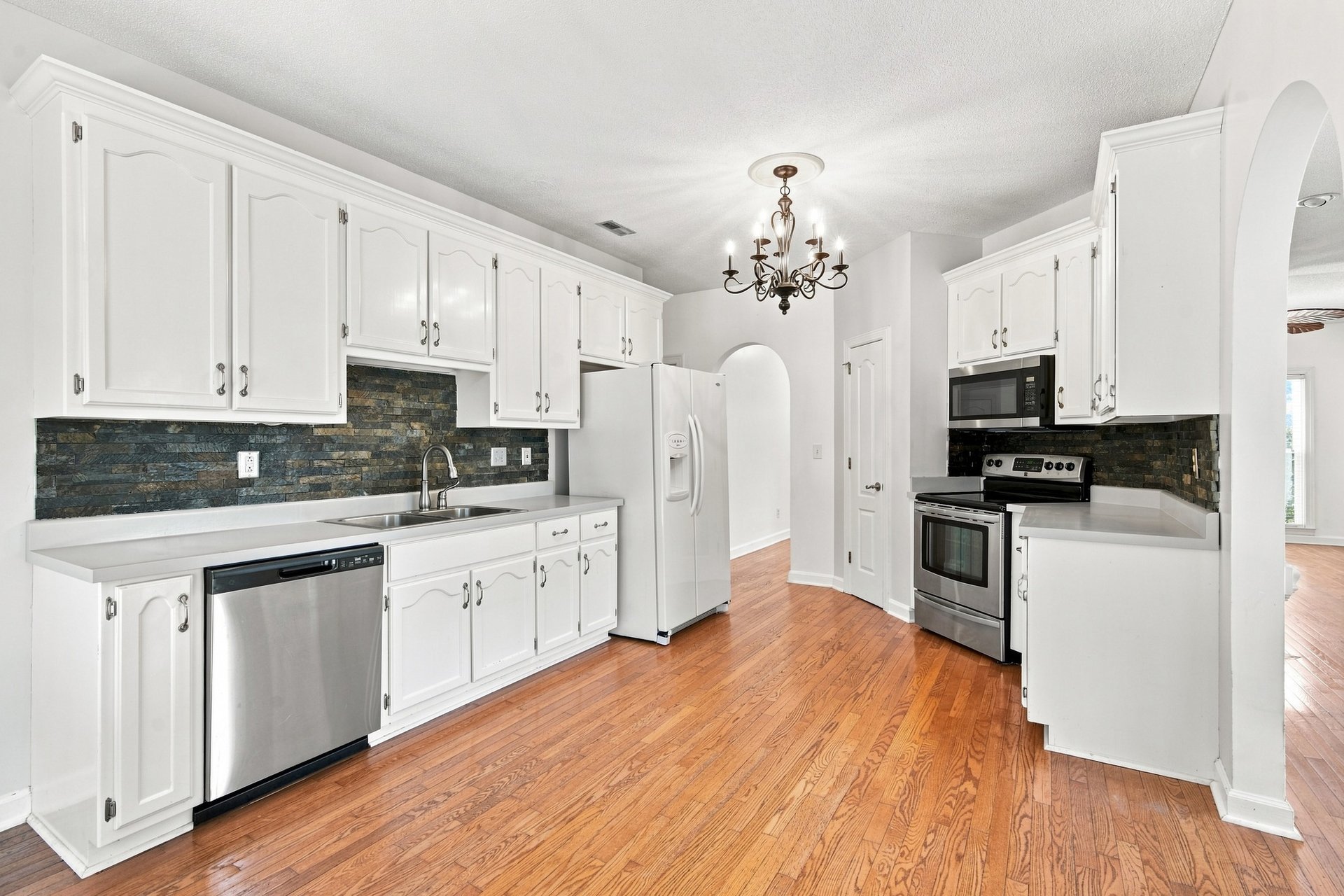 Full-Brick Beauty with Spacious Corner Lot & Private Fenced Backyard
