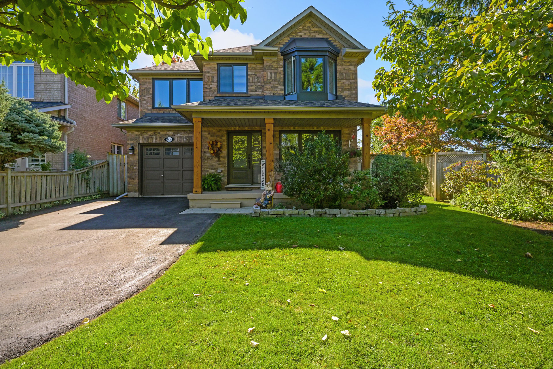 Sun-Filled Sophistication on a Rare Pie-Shaped Lot in West Oak Trails