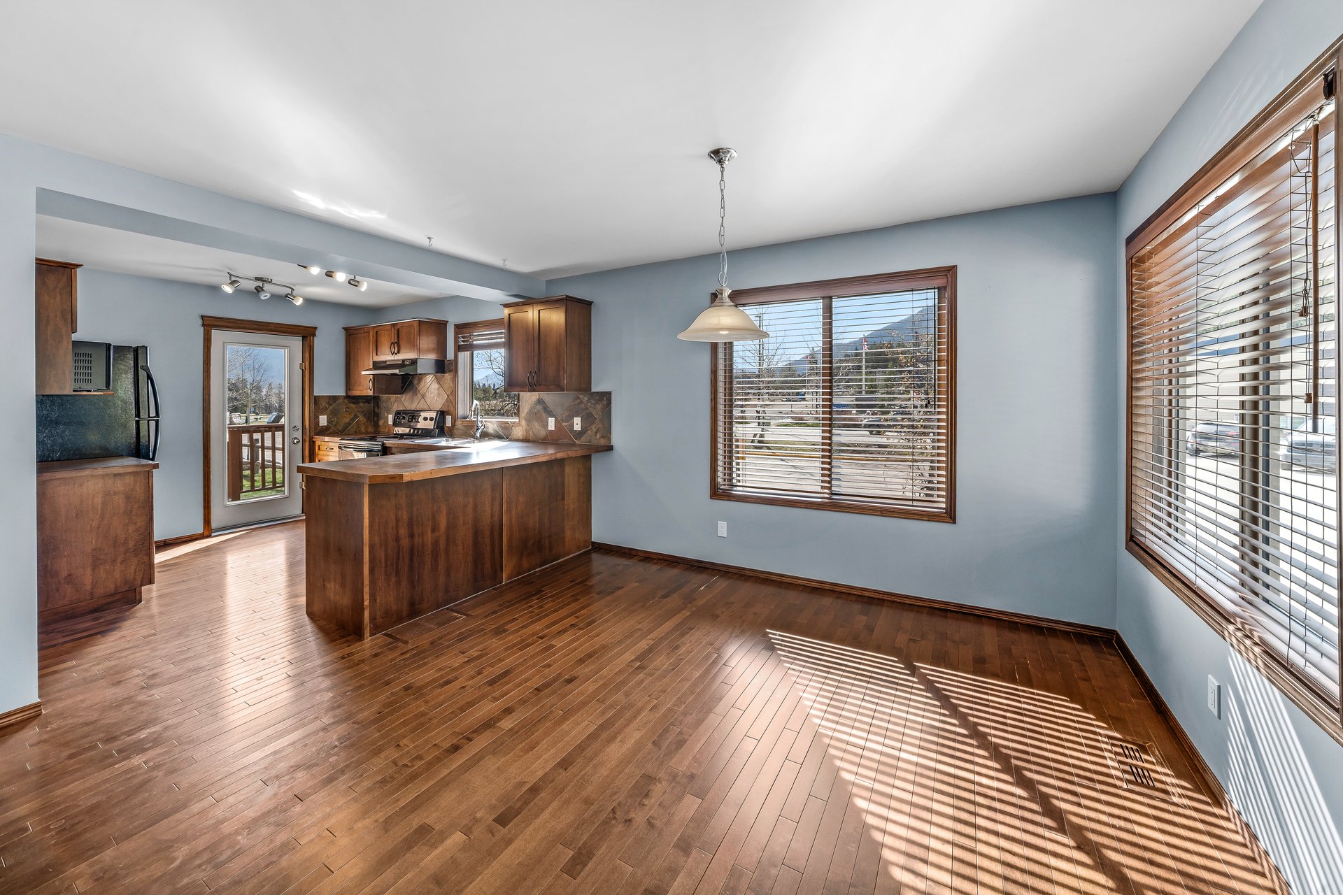 Detached Home in Three Sisters | Bareland Condo