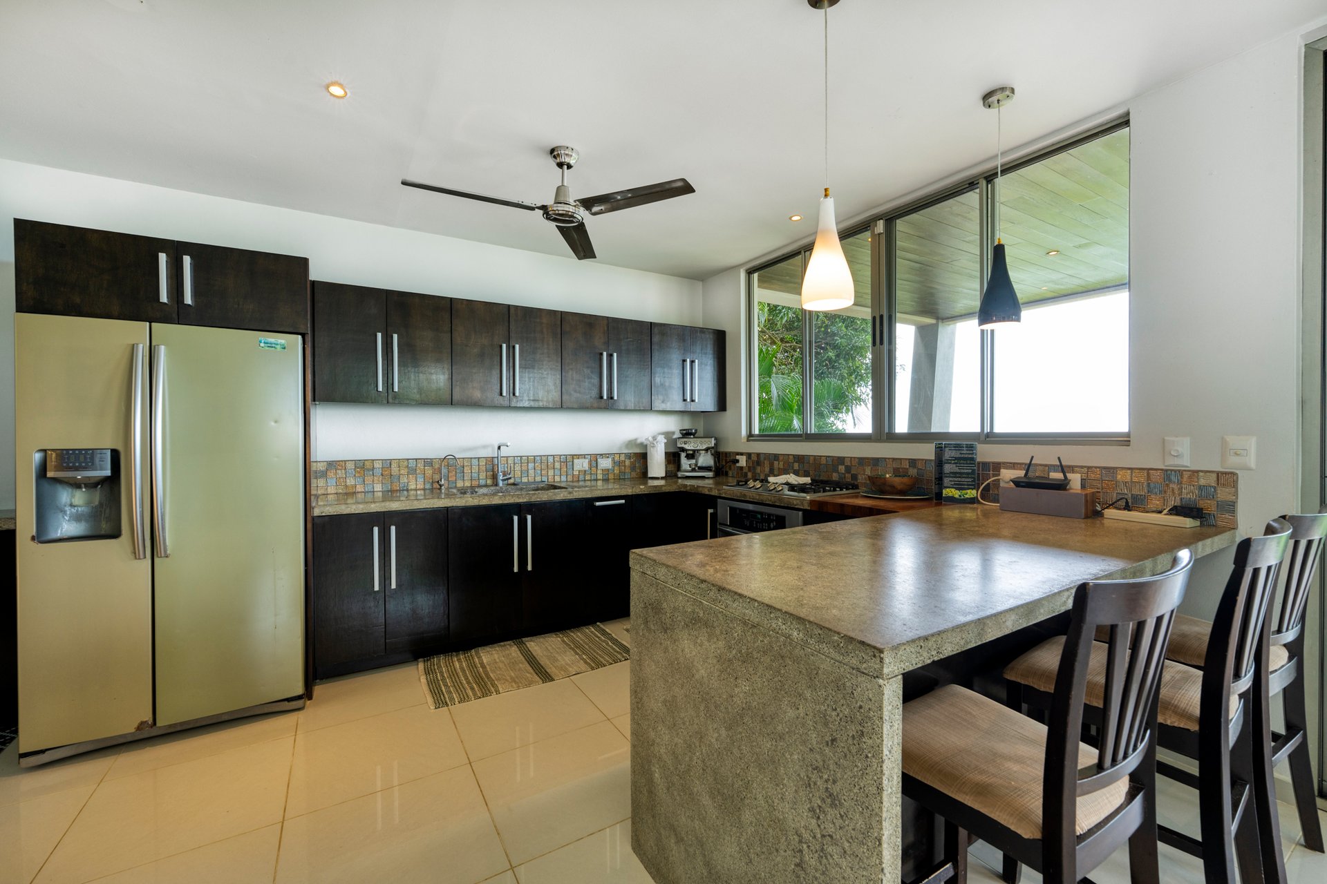 A Modern Jungle Haven with Panoramic Whales Tail Views