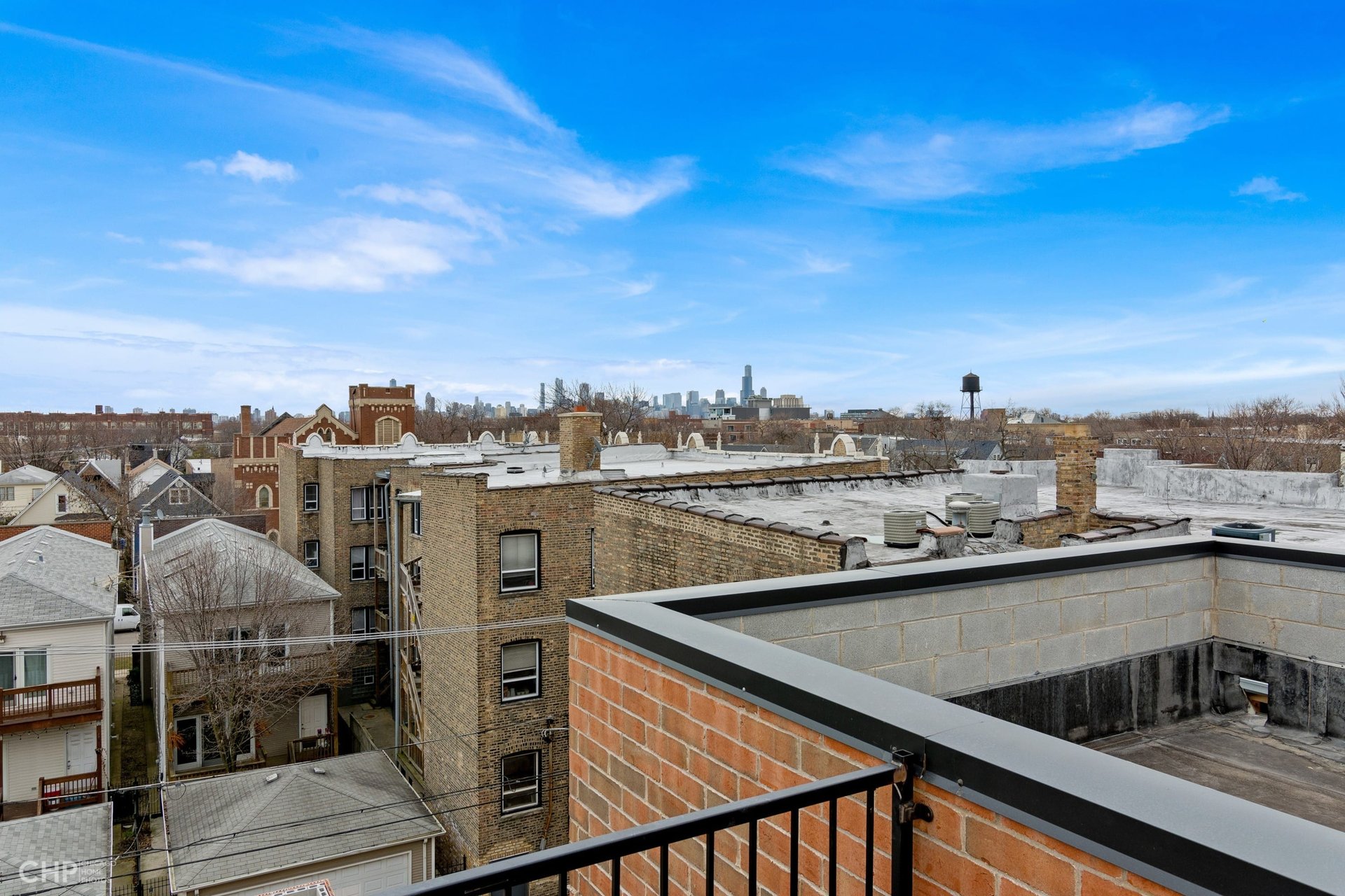 Private Roof Deck with City Views in Logan Square: 1717 Humboldt #3S