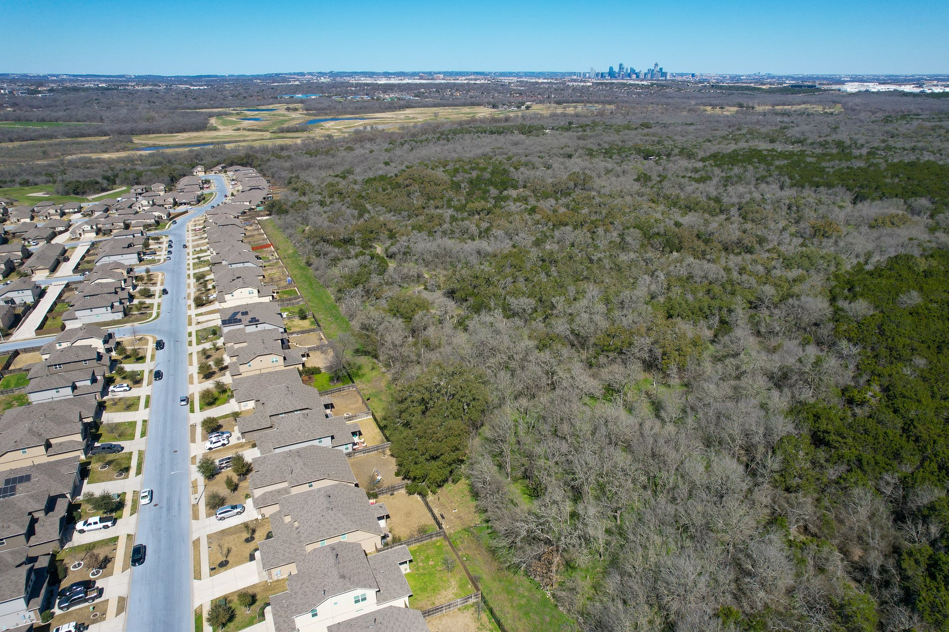Exceptionally rare and meticulously cared-for home, nestled against the breathtaking backdrop of McKinney Falls State Park!