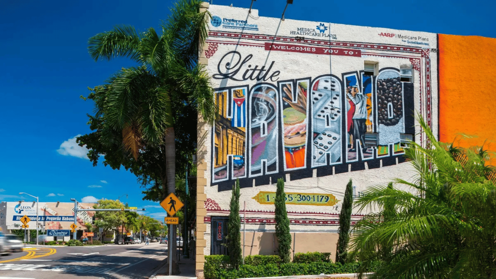 The Edit Real Estate Miami guide showcasing Little Havana's iconic colorful street mural with Cuban cultural imagery and palm trees