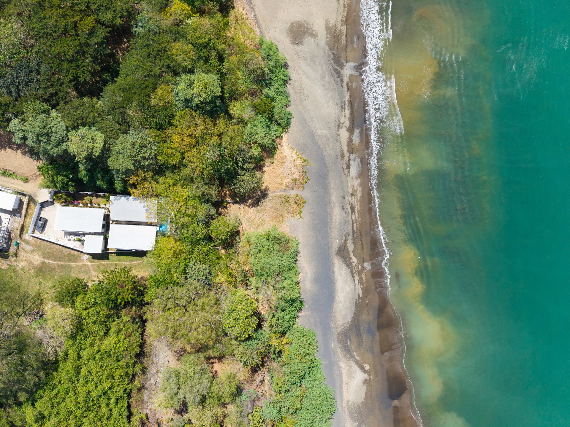 Three Mermaids | Beachfront 10-Bedroom Pod-Style Residence with Pool in Playa Flamingo