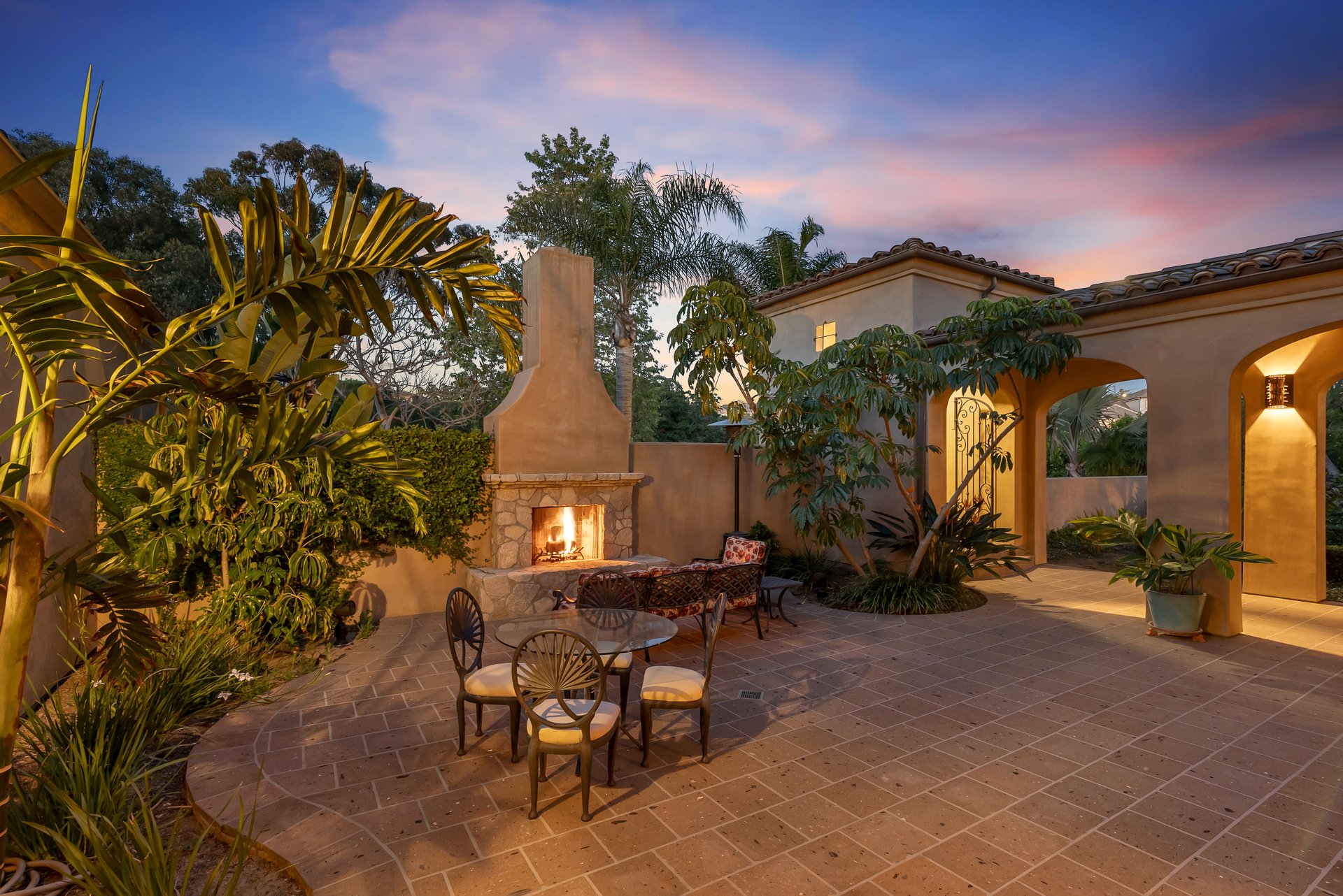 Elegant front exterior of 16733 Calle Hermosa at sunset