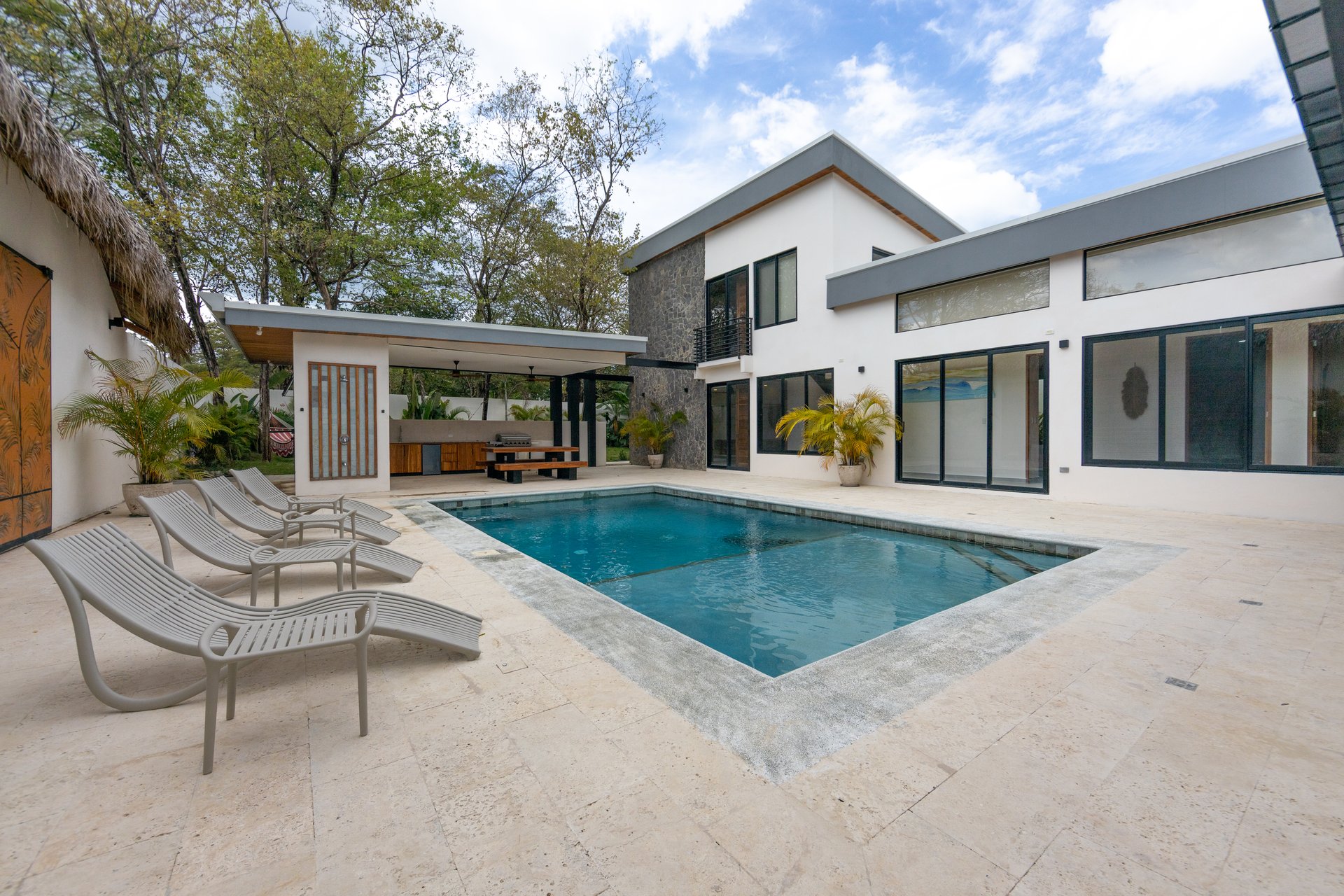 Casa Guacamaya Roja Lot B20 | Elegant 4-Bedroom Home with Pool & Outdoor Kitchen, Steps from Playa Grande Beach, Costa Rica