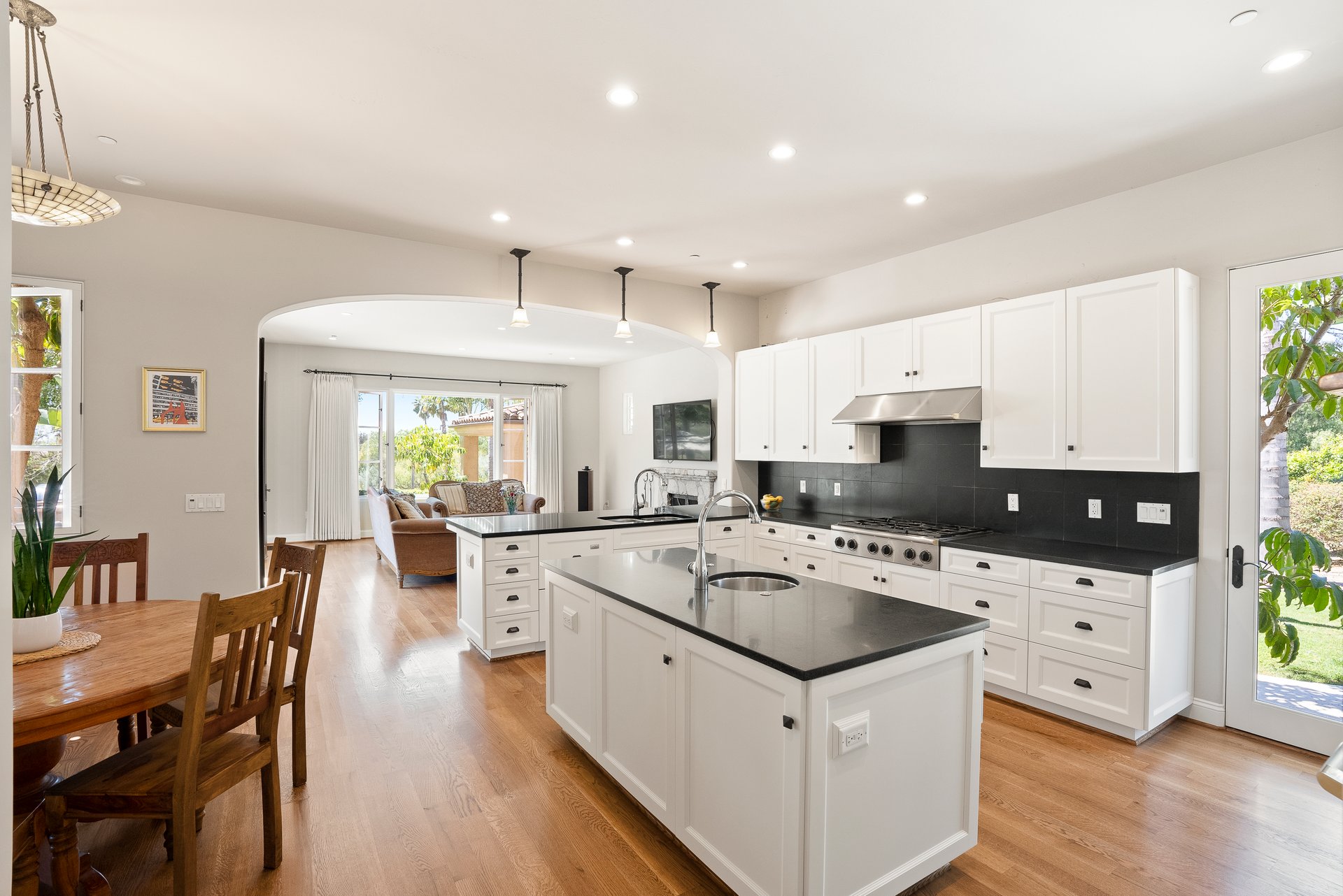 Modern kitchen and dining area inside 16733 Calle Hermosa