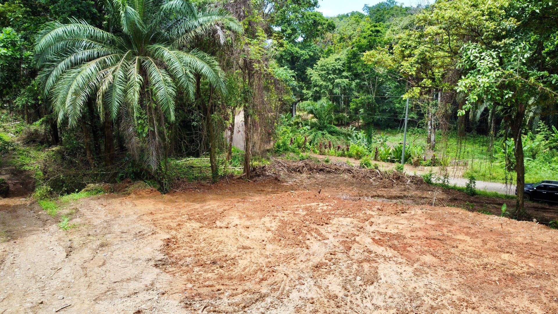 Ready-to-Build Land in San Antonio de Damas: 2,6-Acre with Terraces & Road Frontage