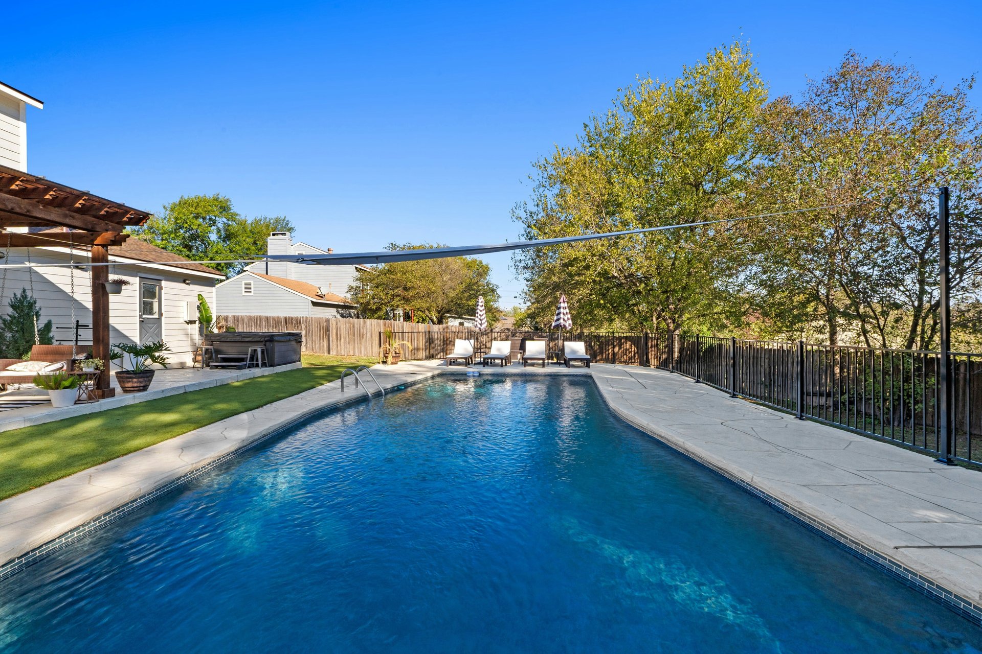 Enchanting Gracywoods Retreat with Pool, Multiple Living Spaces, and Near Domain & Q2 Stadium!