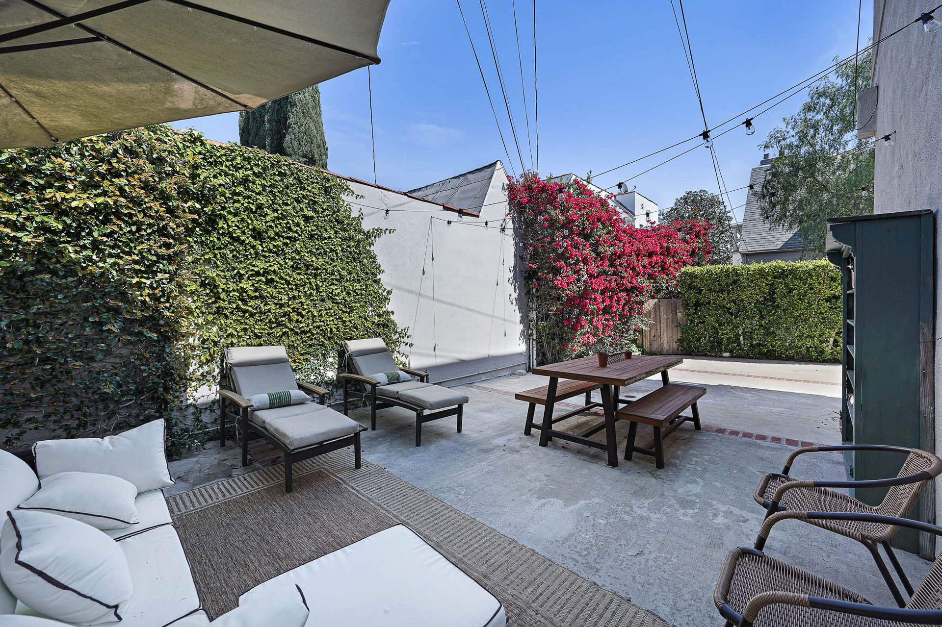 Light & Bright East Coast Traditional Home with Exterior Office & Bonus $2400/mos Rental Unit Above Garage -  in coveted Miracle Mile South!