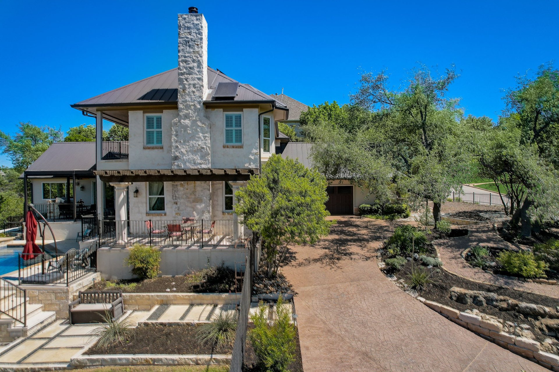 Hill Country Paradise: Luxurious 4/3 Home with Heated Pool/Spa and Spectacular Sunset Views in River Place!