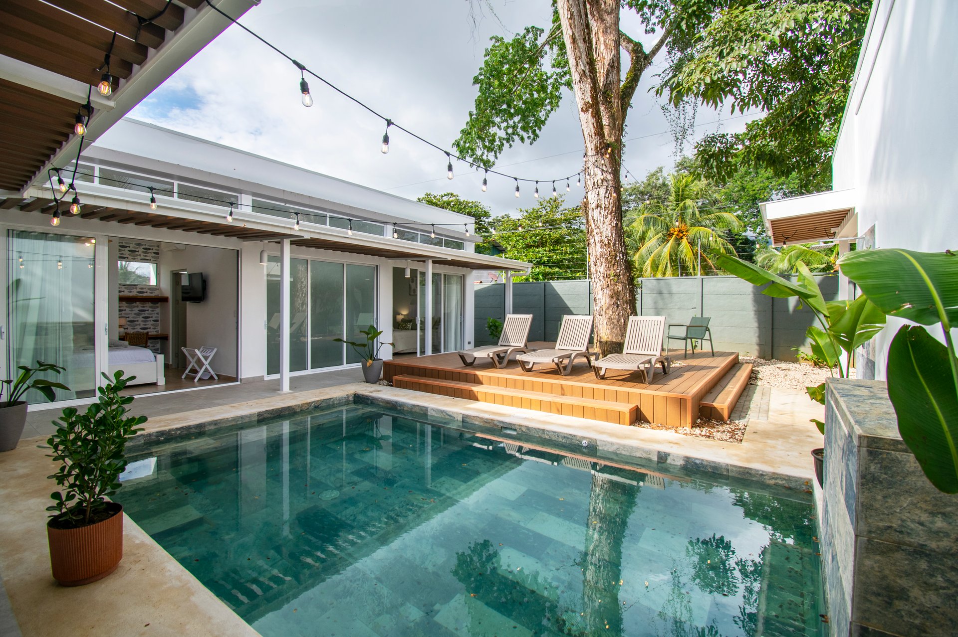 Turnkey Tropical Home Steps from the Beach