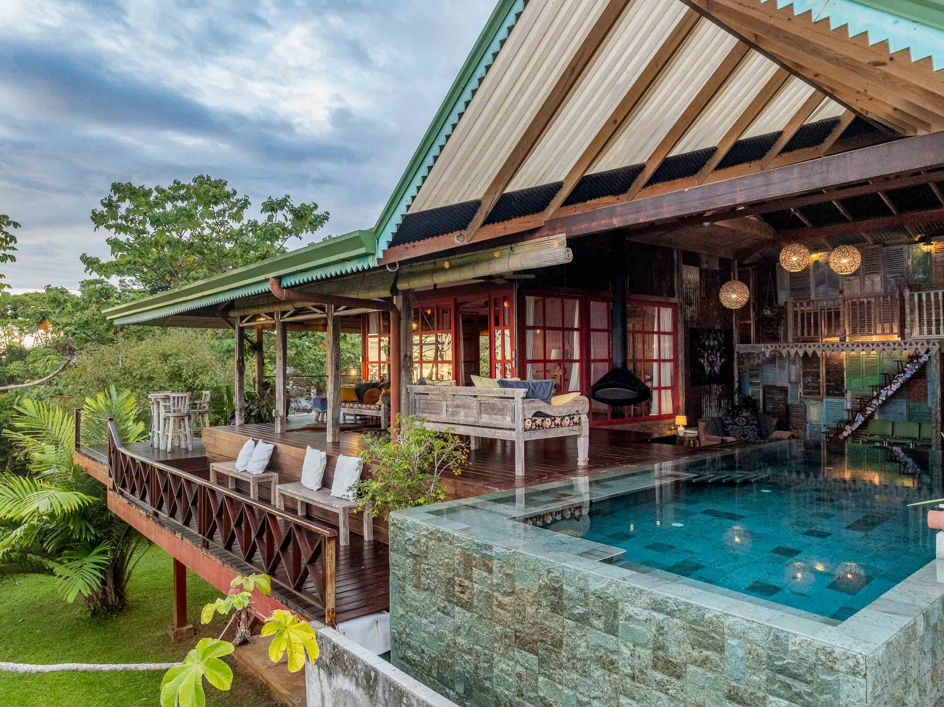 A Handcrafted Residence Immersed in Nature Above the Canopy Ocean View Architectural Home