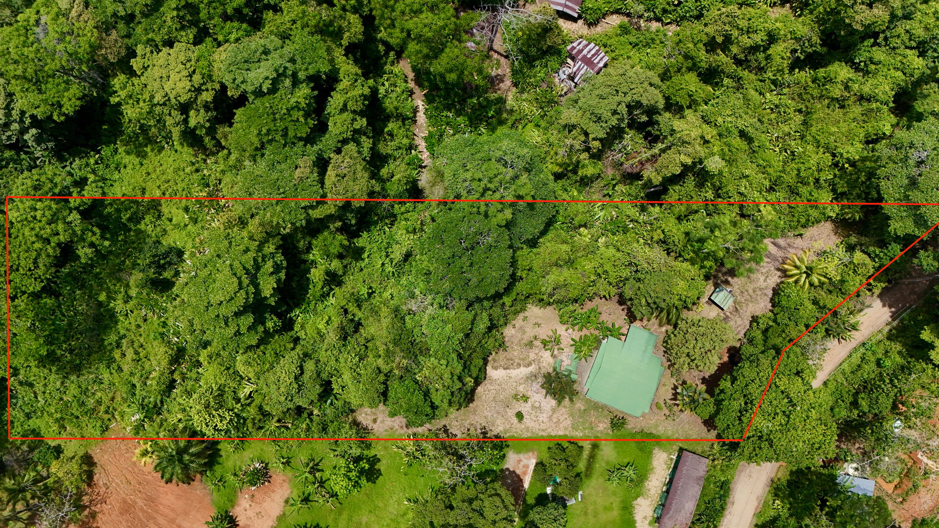 La Unión Road Investment Opportunity - 2.2 Acres with Existing Teak Cabin & River Access 