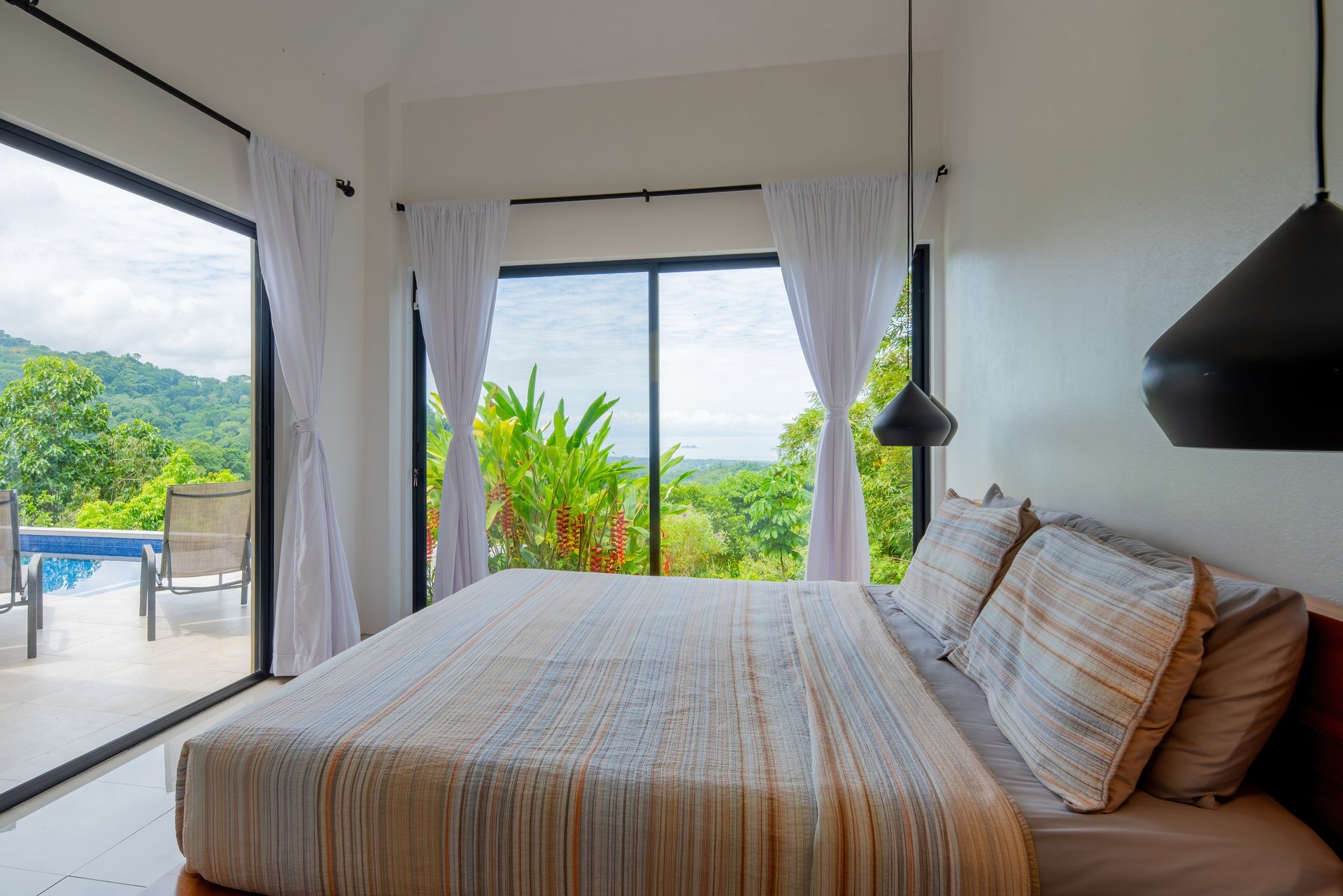 6.45 ACRES – 3 Bedroom Luxury Ocean View Home Surrounded By Vibrant Rainforest And Wildlife!!!