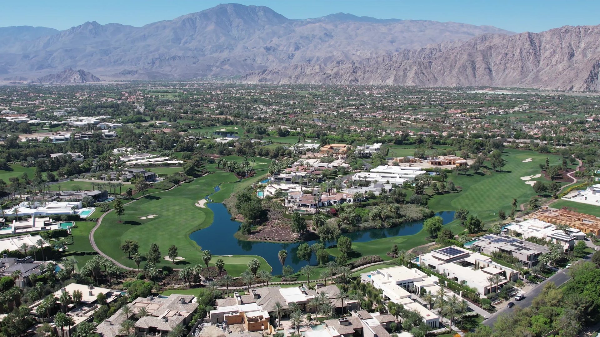 Homes and golf course at The Hideaway Golf Club in La Quinta with the Santa Rosa Mountains behind