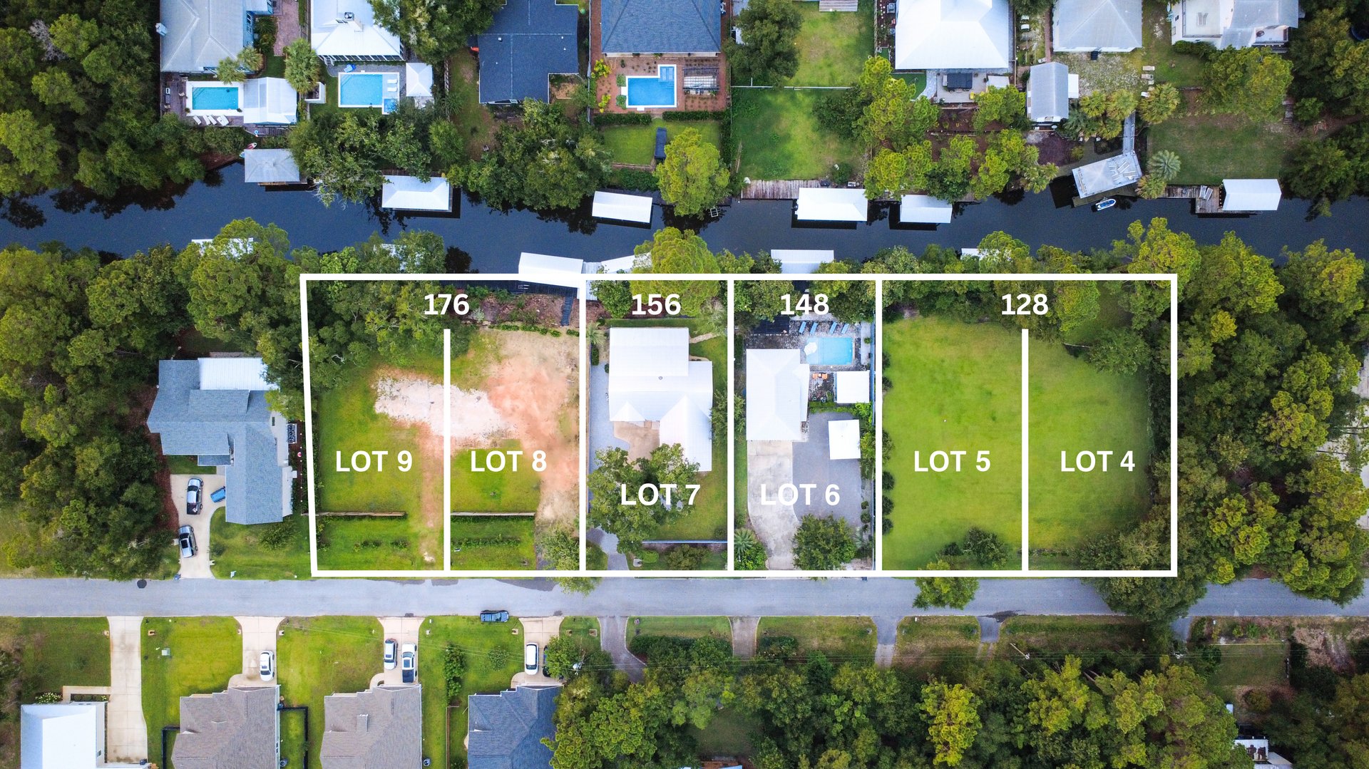 Aerial lot map marking Lots 4–9 between a canal and a road.