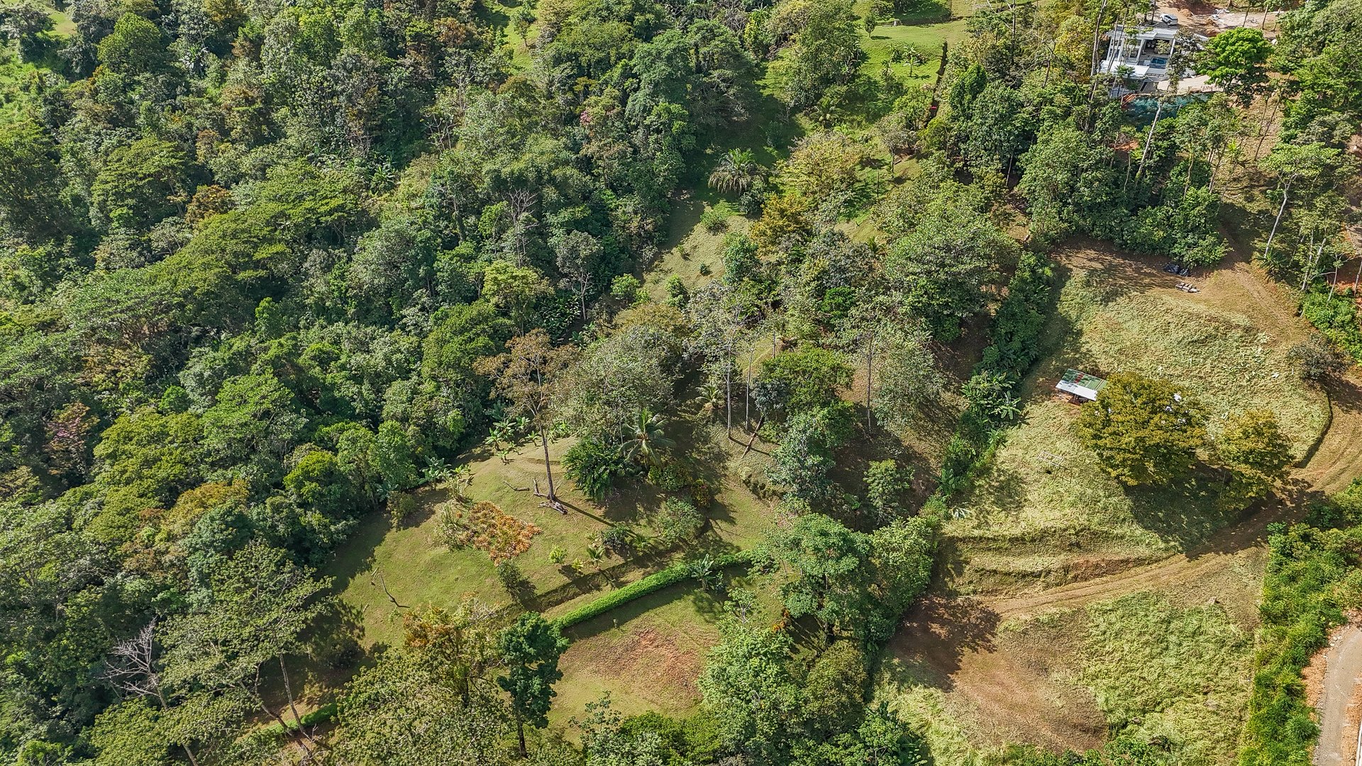 A Huge Rainforest, River & Waterfall Property With TWO Mountain & Jungle-View Luxury Homes on a Massive 4.93 Acre Lot – PLUS an Additional Plantel ready for Development