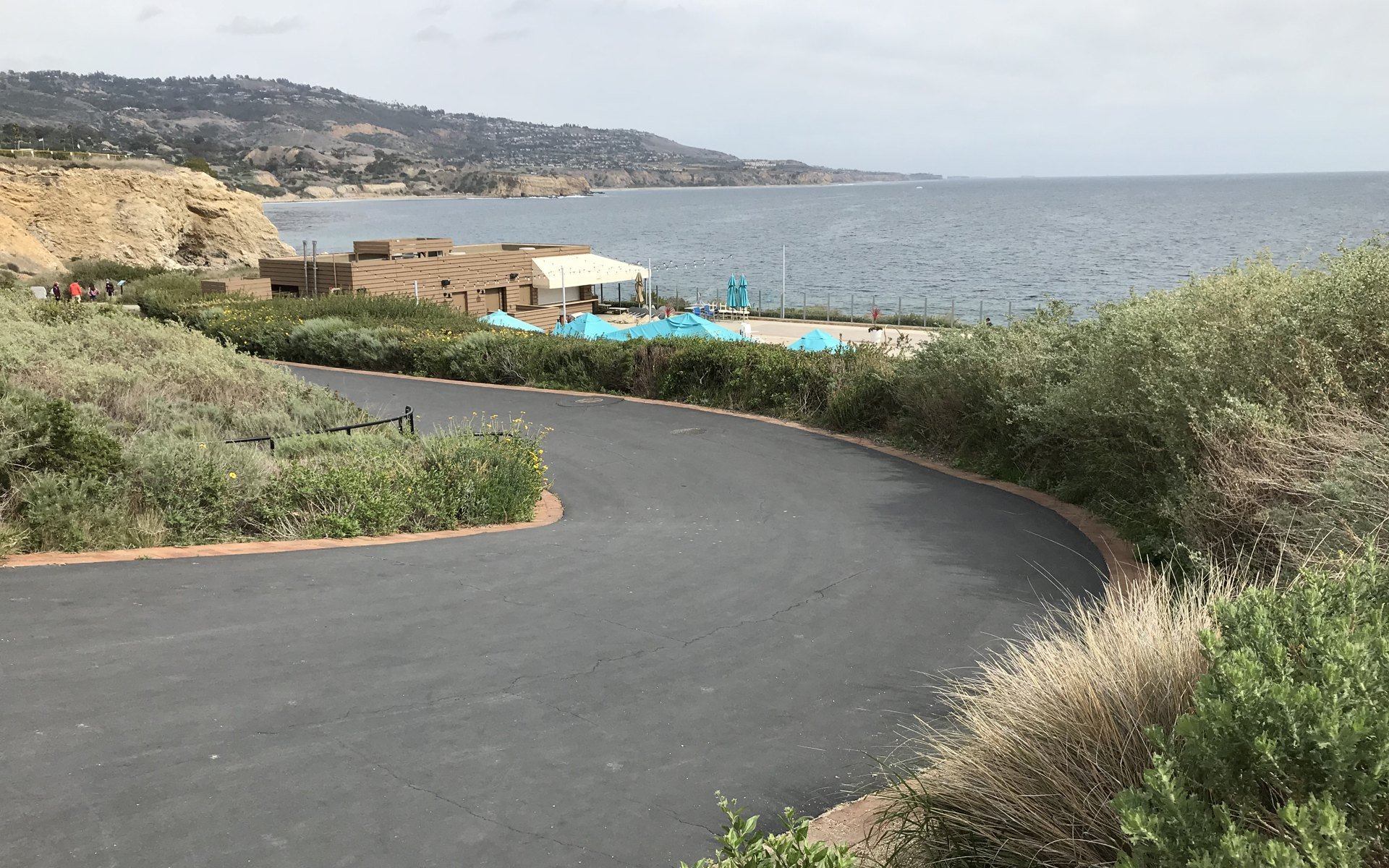 Landscaped path and coastal resort buildings at Terranea in Rancho Palos Verdes