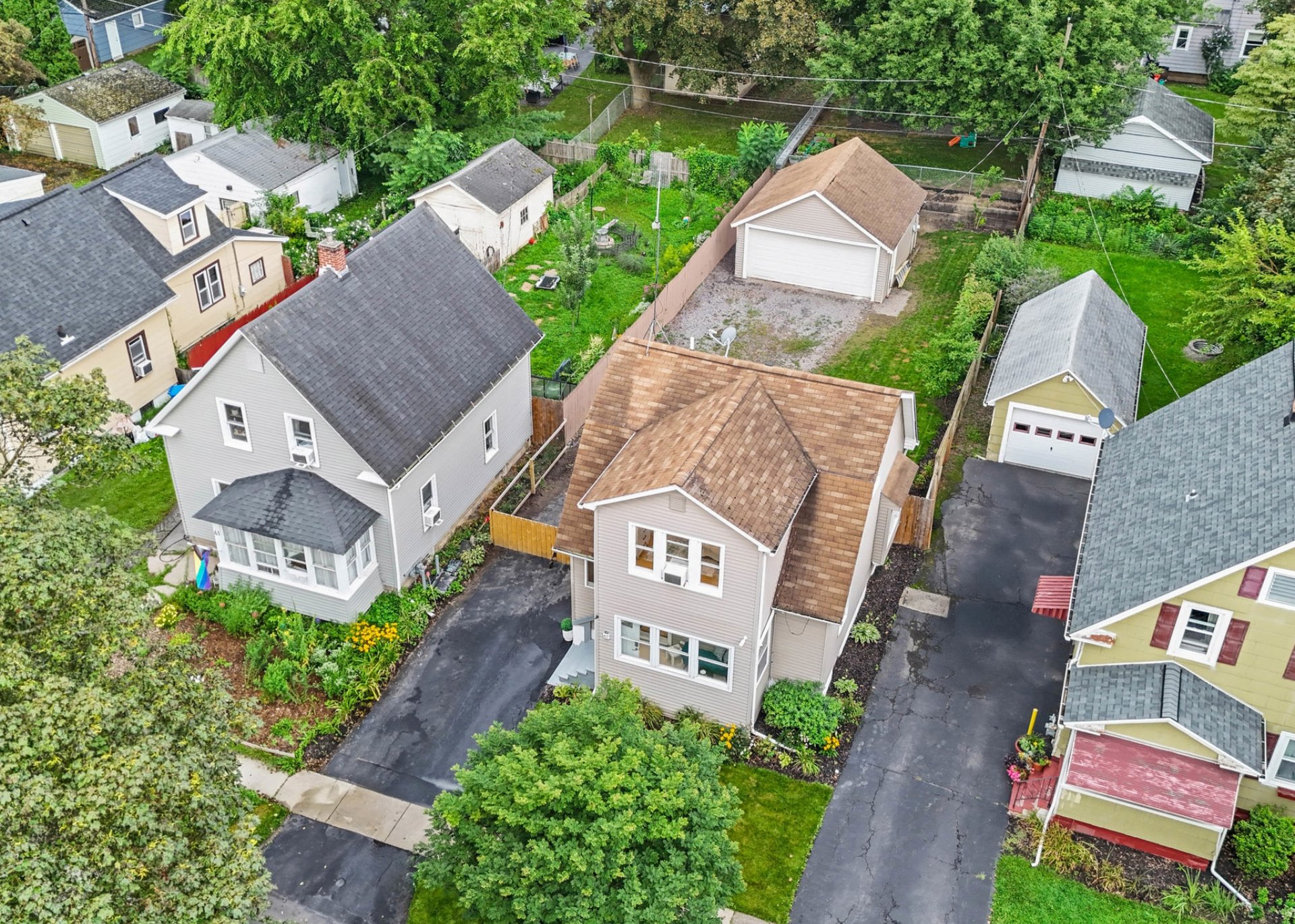 Modern North Winton Village Colonial With 2 Car Garage