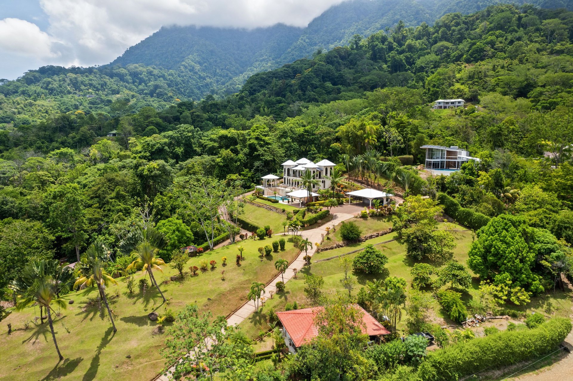 OCEAN VIEW ESTATE HOME WITH GUEST BUNGALOW, CARETAKER HOME, FRUIT TREES, AND WATERFALL – 3.47 ACRES