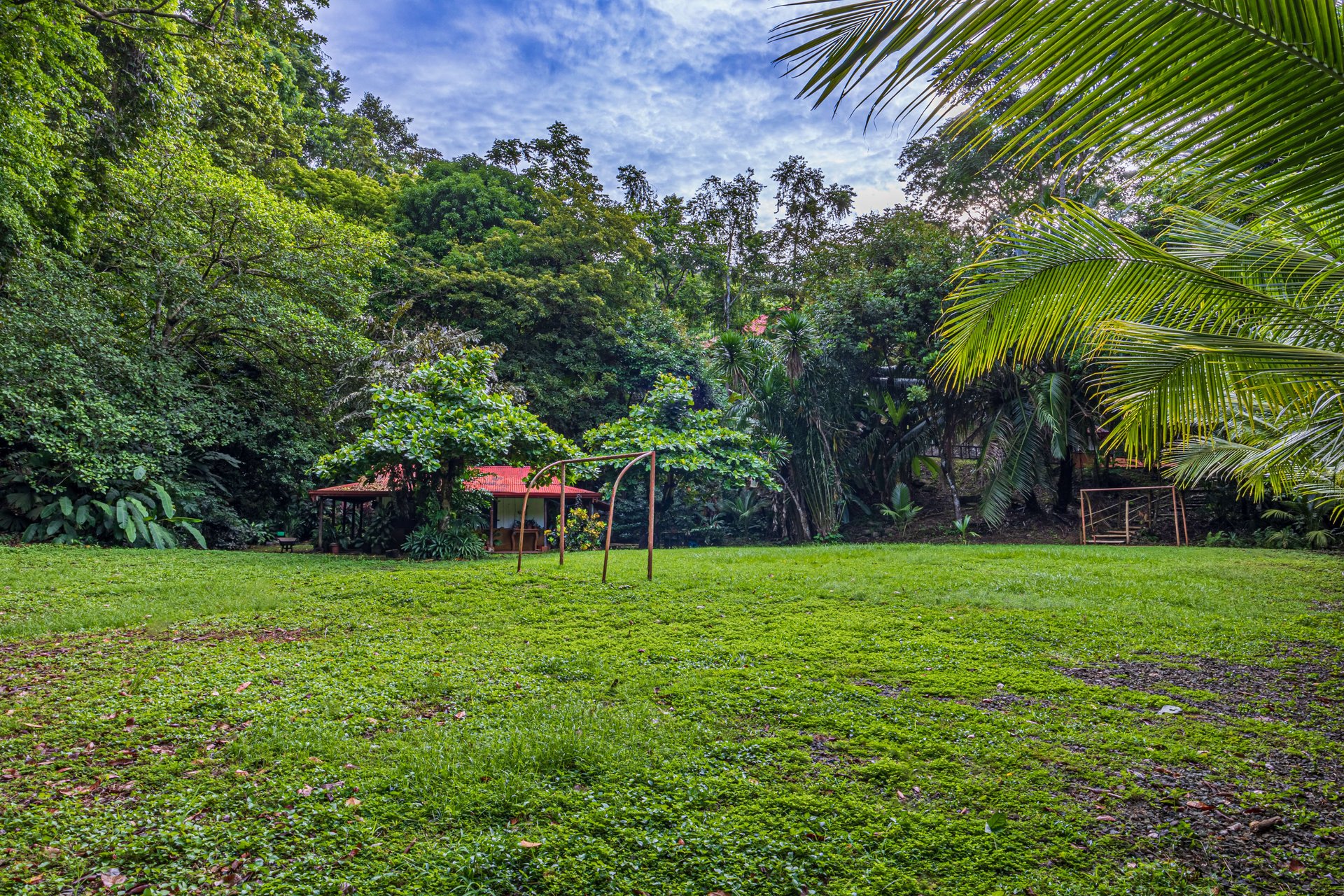 10-Acre Uvita Commercial Property with Existing Hotel & Highway Frontage – Development Potential Near the Beach