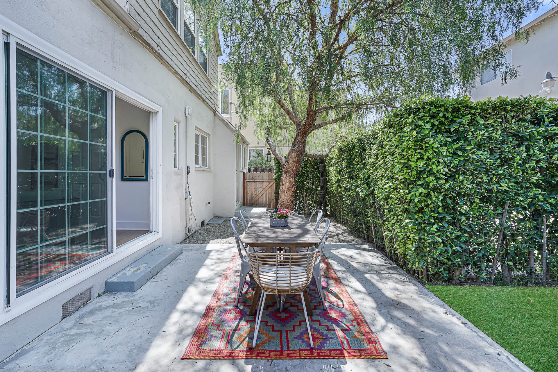 Light & Bright East Coast Traditional Home with Exterior Office & Bonus $2400/mos Rental Unit Above Garage -  in coveted Miracle Mile South!