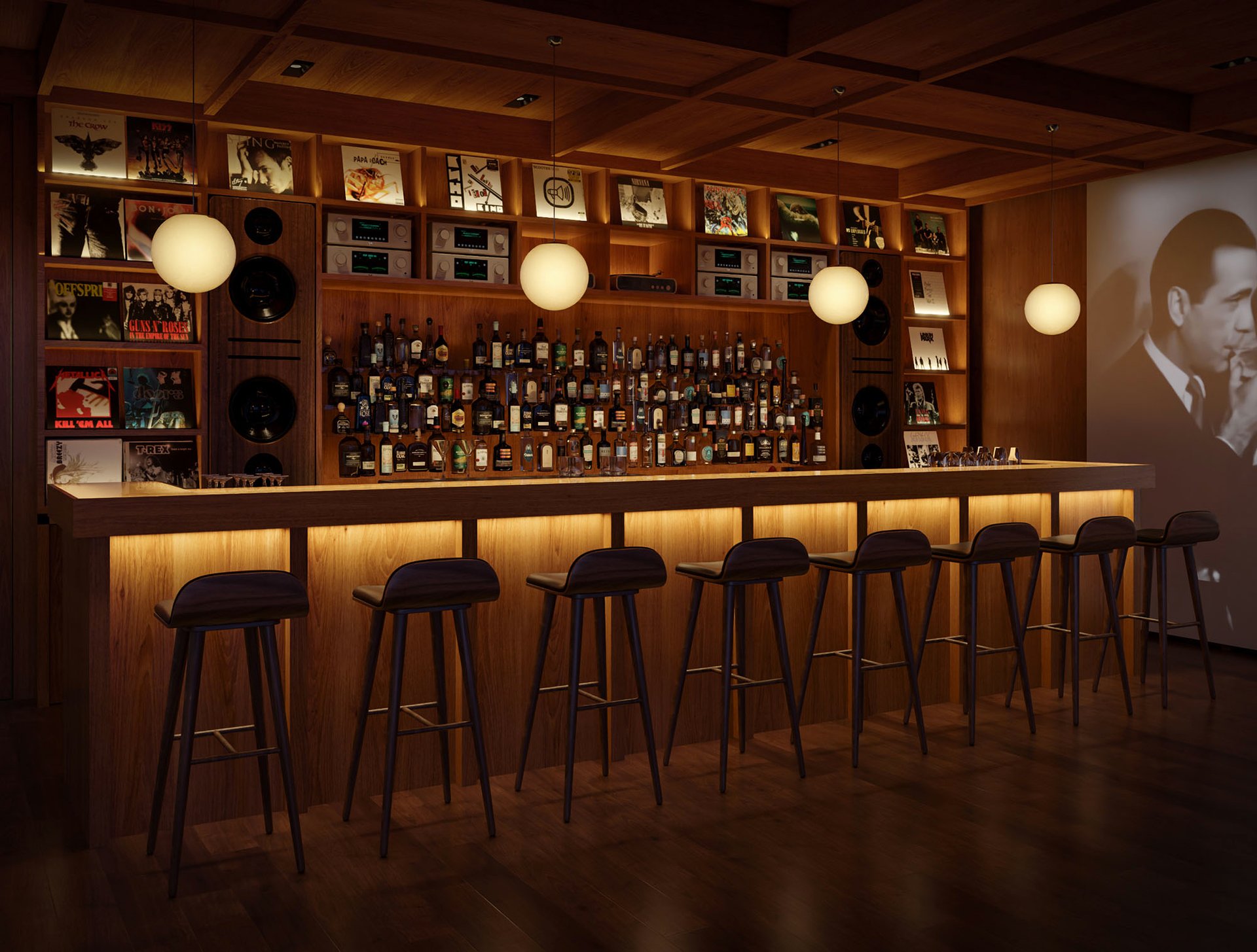 Residents’ bar with a backlit wooden counter, globe pendant lights, and shelves of liquor and records.