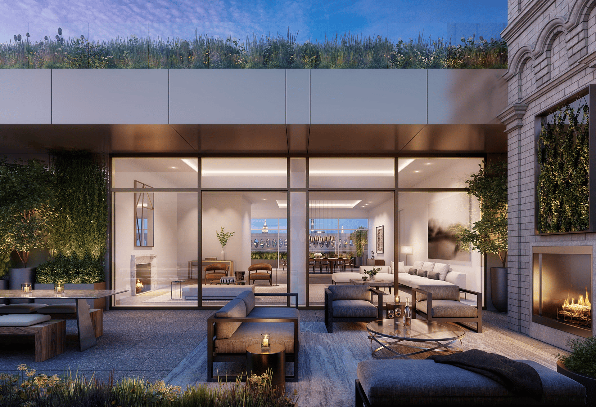 Rooftop terrace with lounge seating, planted garden beds, glass-walled living room, and outdoor fireplace.