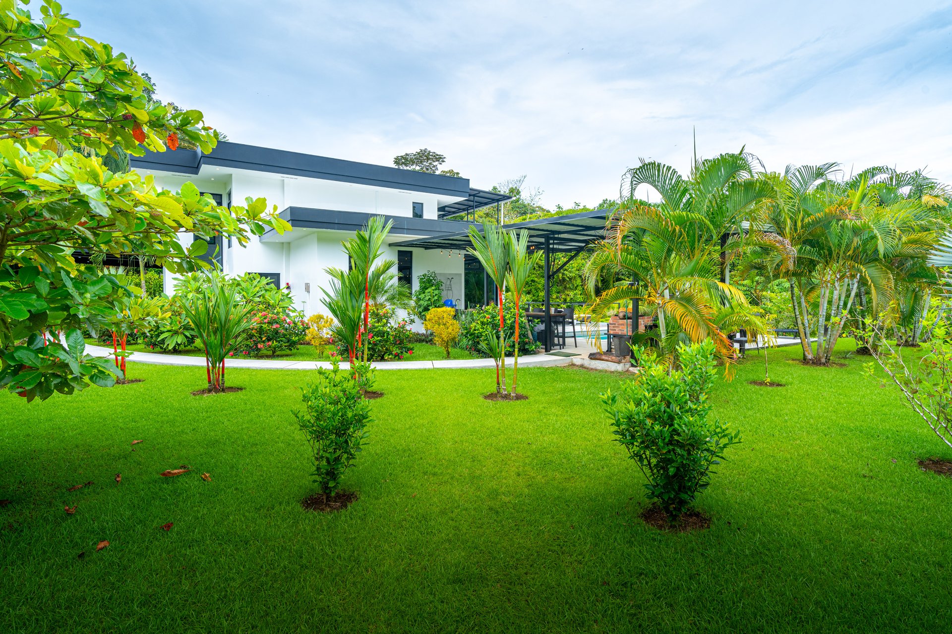 Modern 4-Bedroom Family Sanctuary with Infinity Pool, Edible Forest Garden - Exclusive Gated Ojochal Community 