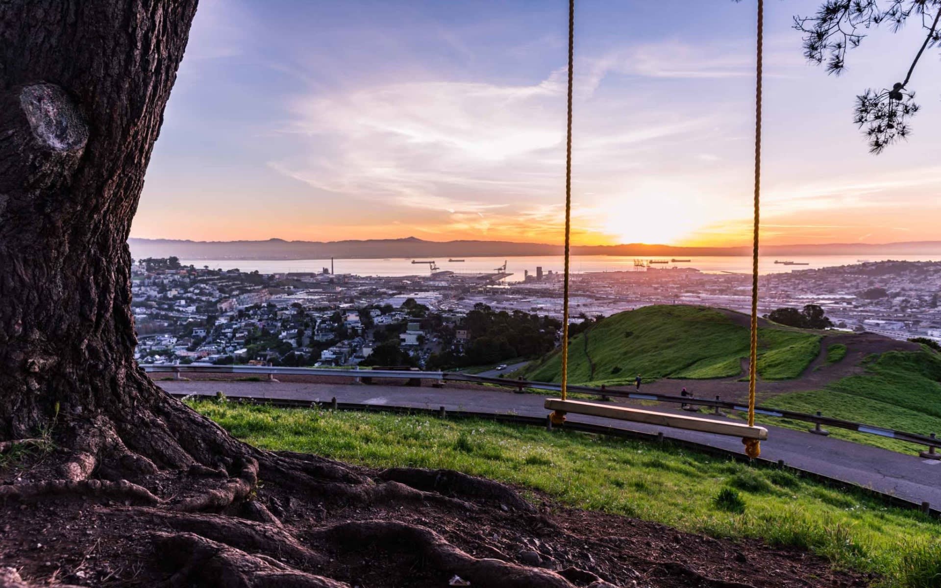 Bernal Heights overlook with a neighborhood view toward the bay at sunset