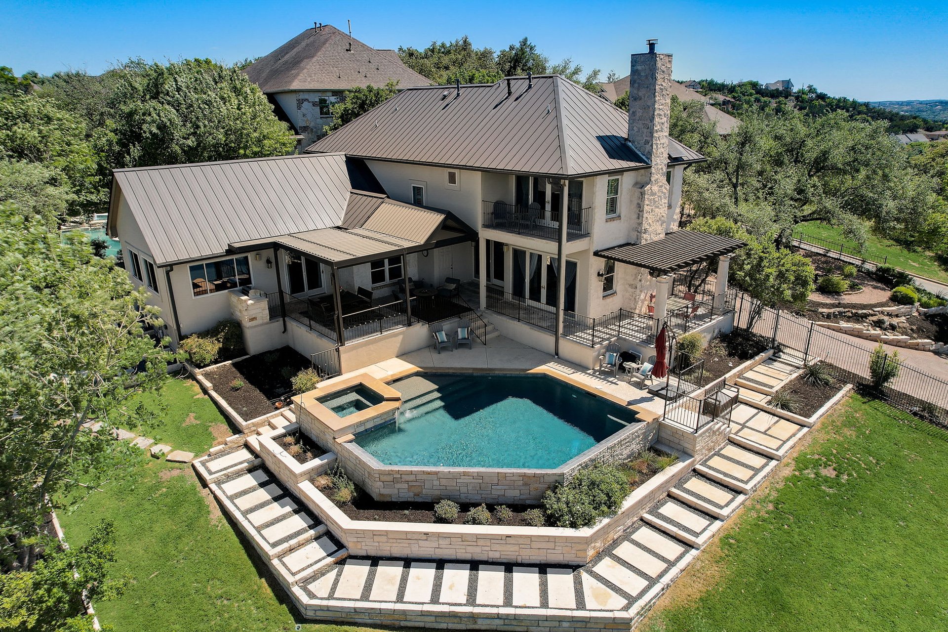 Hill Country Paradise: Luxurious 4/3 Home with Heated Pool/Spa and Spectacular Sunset Views in River Place!