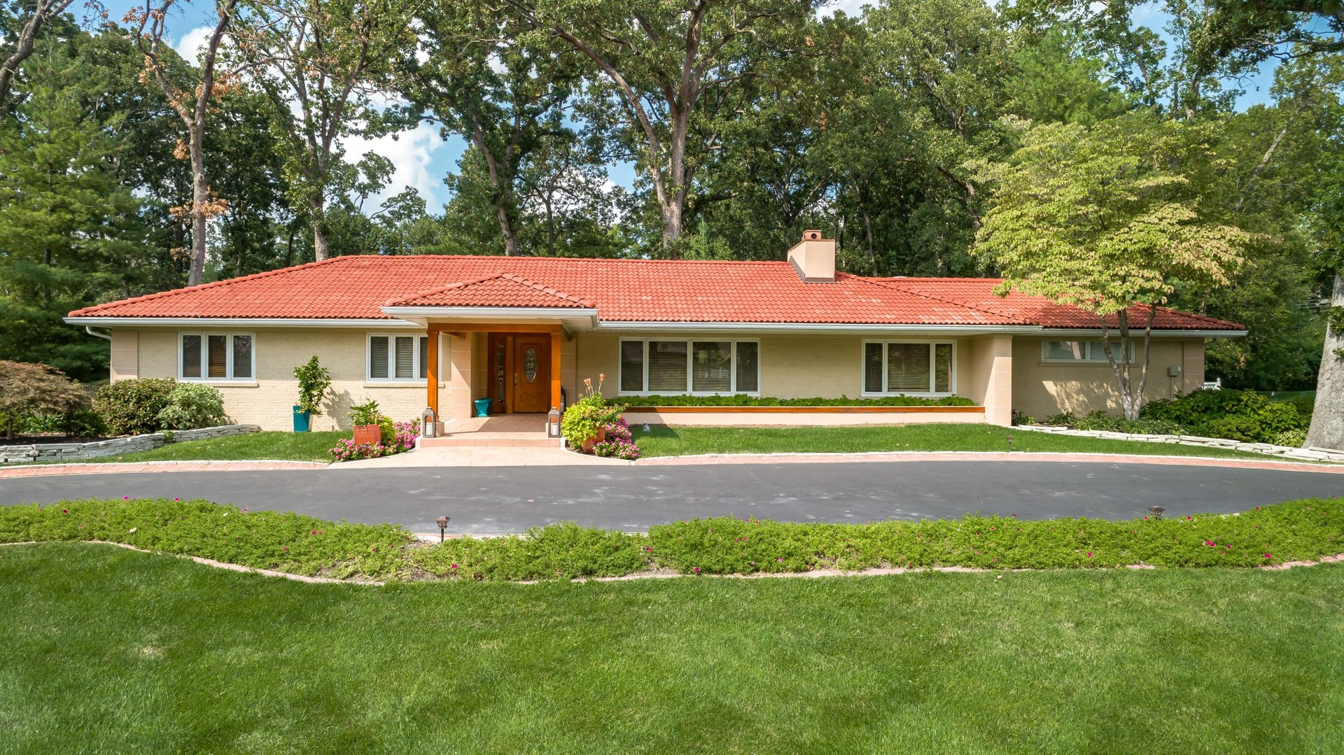 A Special Retreat on a Prized One Acre Lot With Pool and Tennis Court